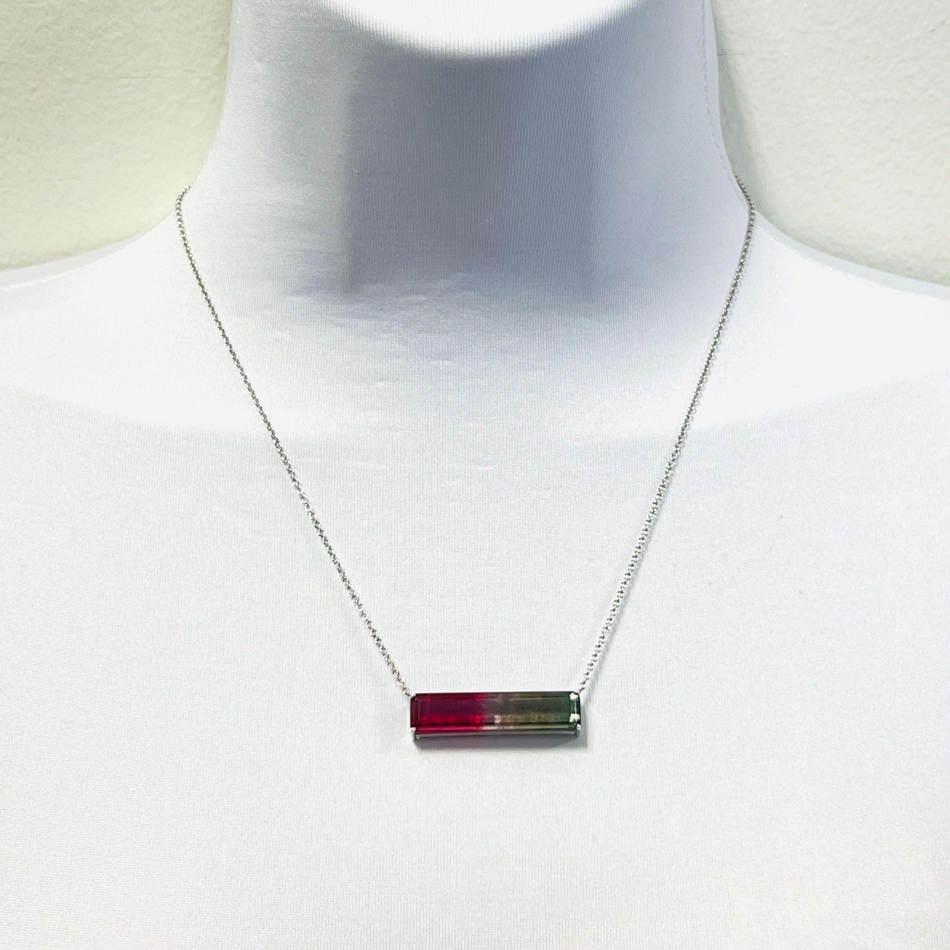 Beautiful 12.00 ct. watermelon tourmaline rectangle.  Handmade in 18k white gold.  Length is 17
