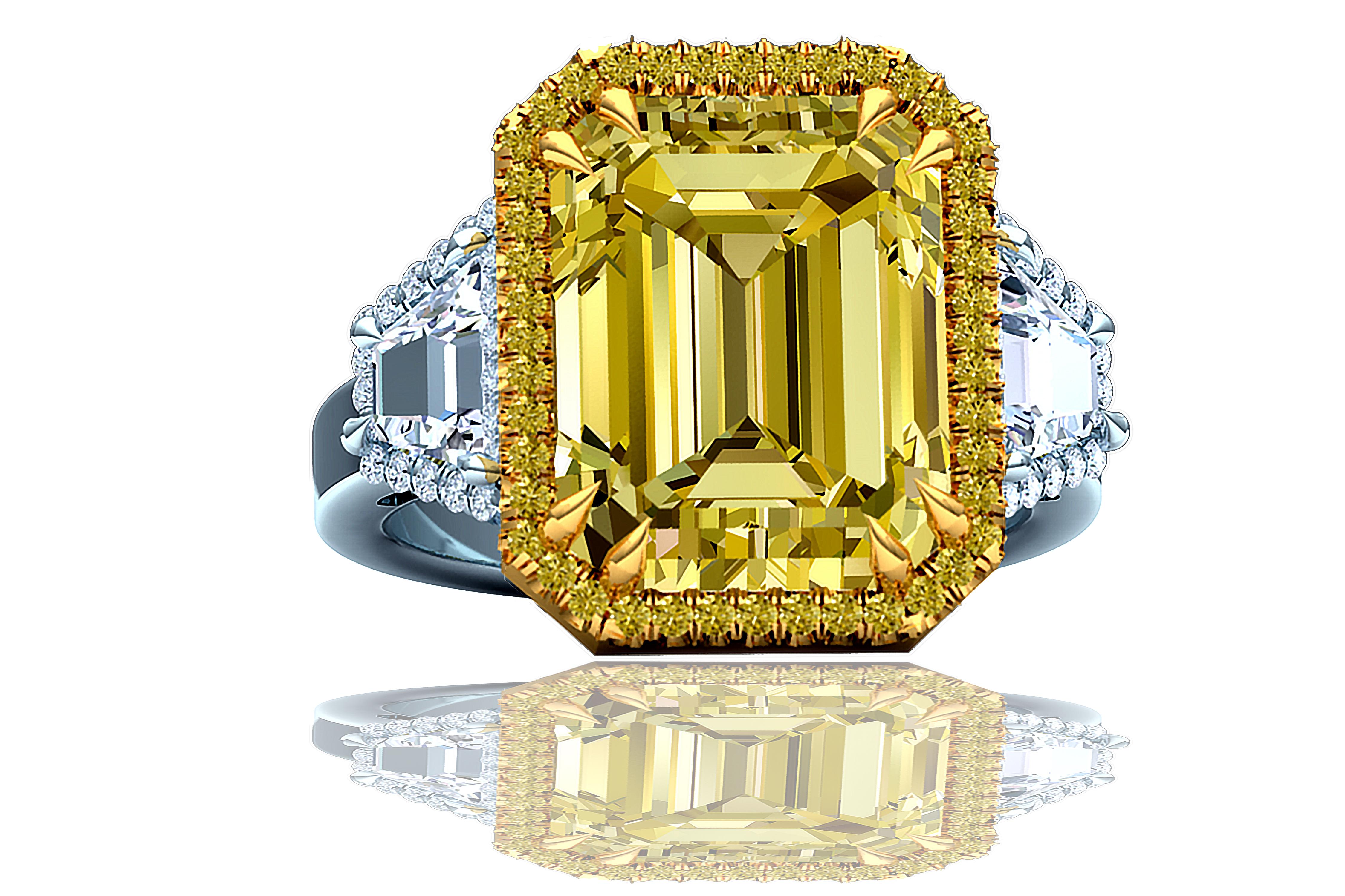 This classically inspired yellow sapphire emerald three stone ring is nothing short of magnificent.  Here's a rare opportunity to own a sapphire that comes from an estate the purchased the stone directly from Sri Lanka.  The center stone is a large