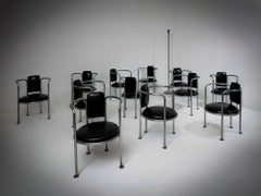 10 Chrome Black Leather Armchairs in the style of Gae Aulenti Poltronova, 1960s