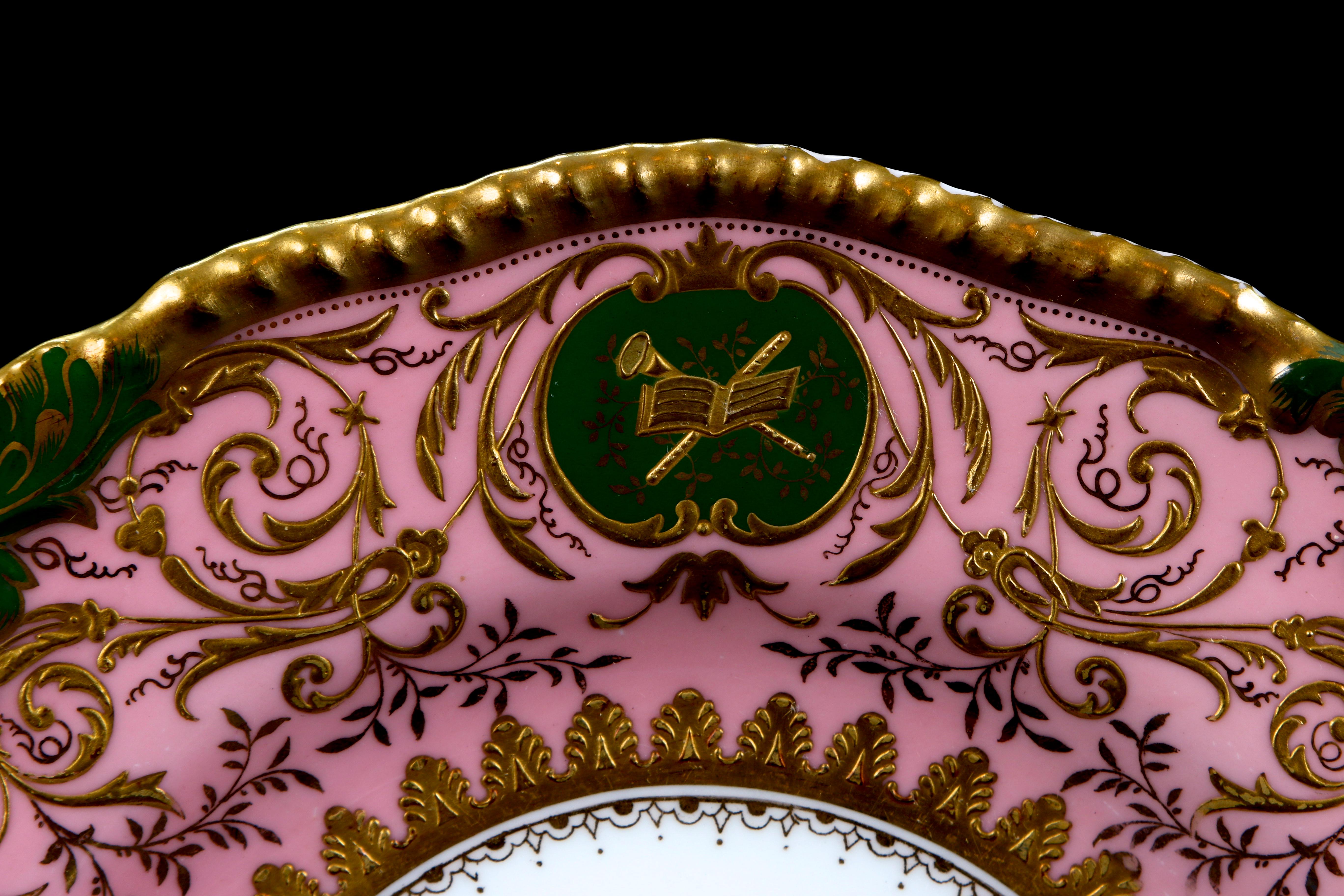 Rococo 12 Coalport Pink and Green Heavily Gilded Plates Featuring Musical Instruments
