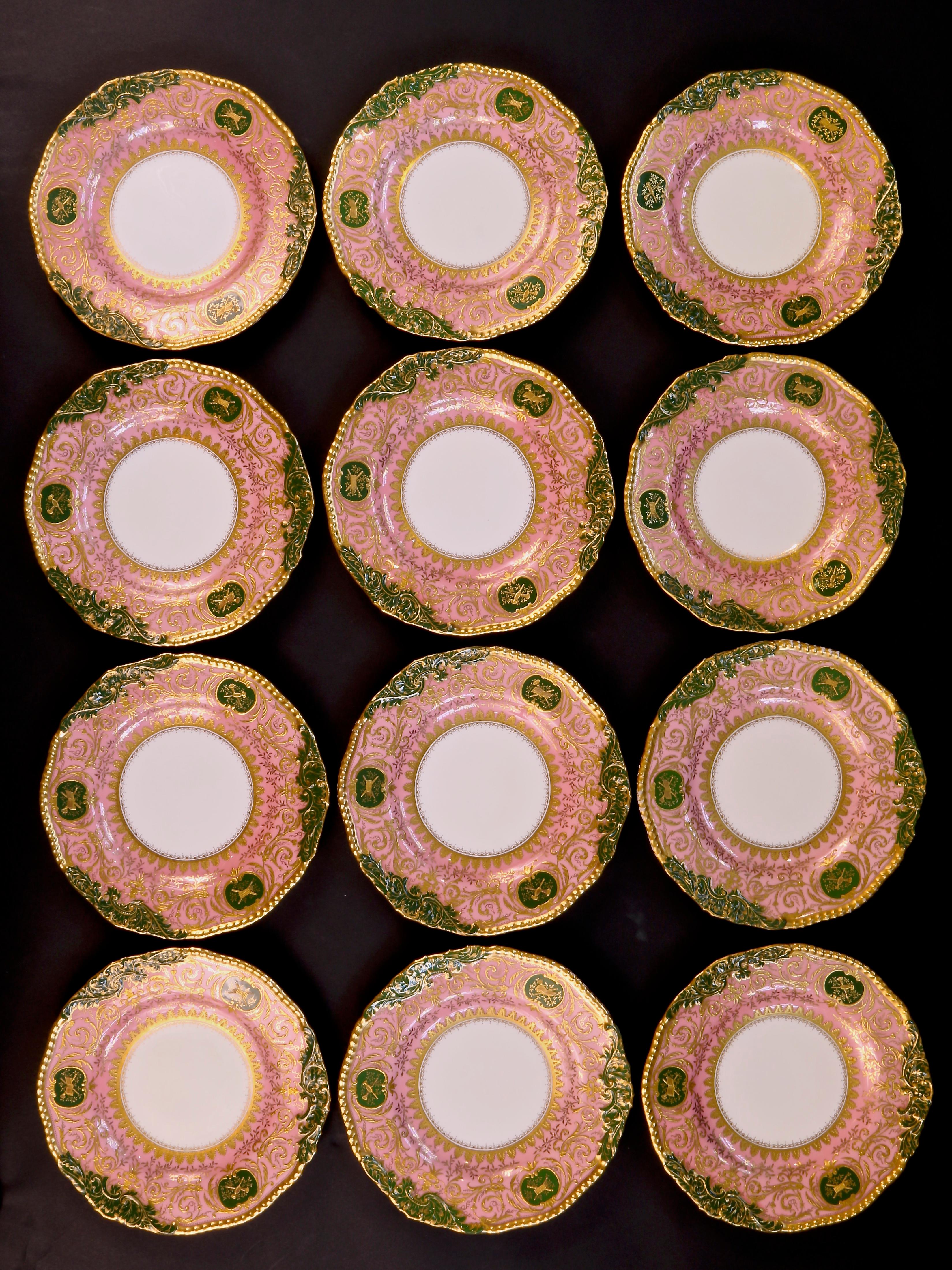 Burnished 12 Coalport Pink and Green Heavily Gilded Plates Featuring Musical Instruments