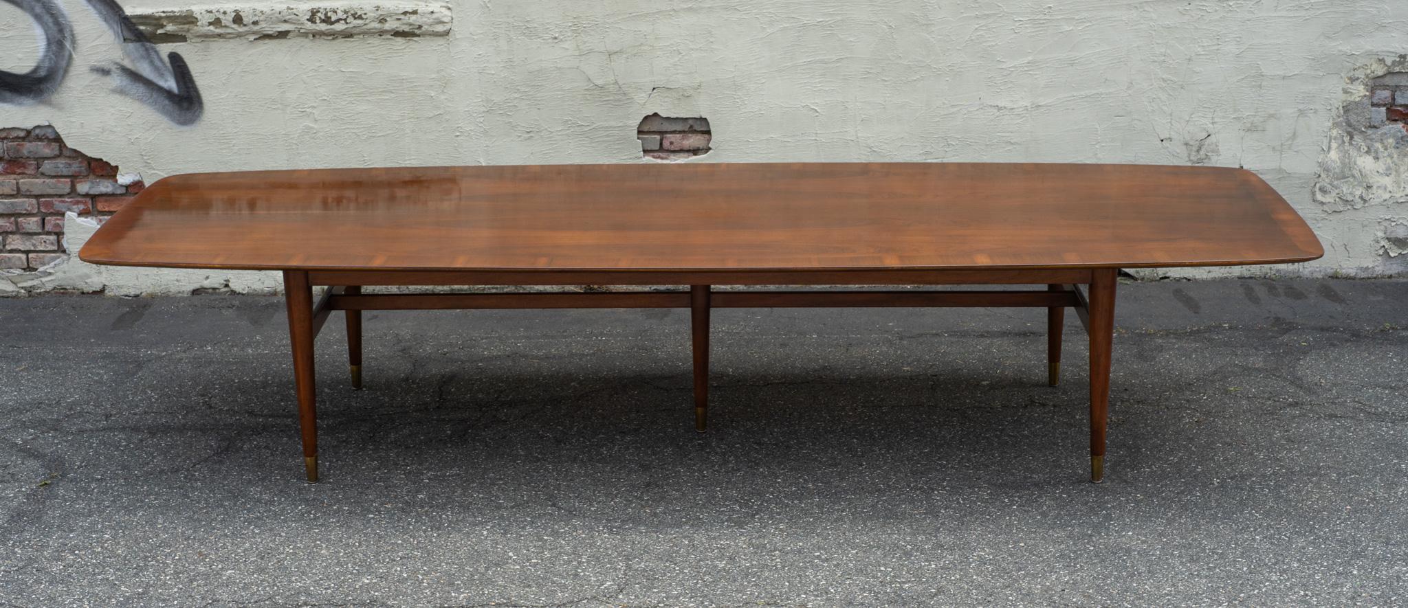 This vintage and classic Standard Furniture Company table is very large (12' long) and very cool! Designed by William H. Sullivan in the 1950s, the design has held up extremely well. Easily one of the most unique and beautiful tables to come out