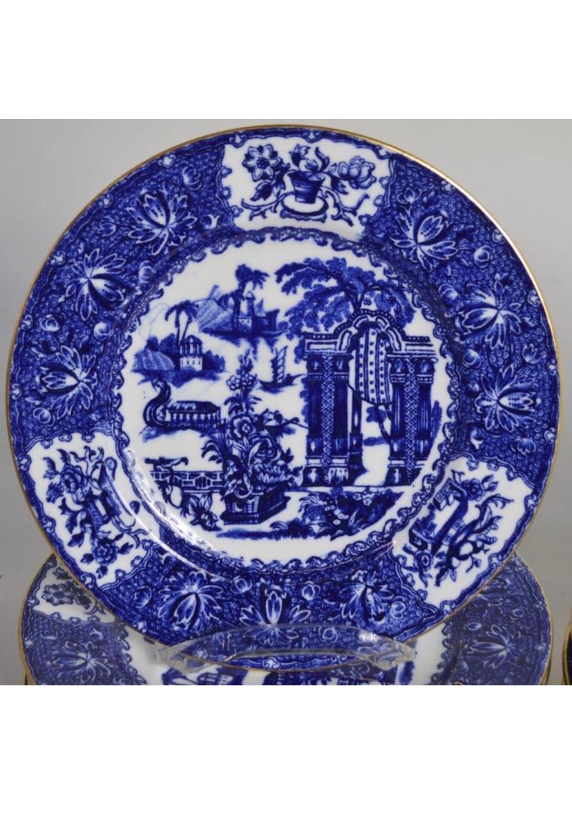 A classic and elegant pattern of all over blue on Copeland Spode's crisp white porcelain. A Blue Willow scene throughout in nice detail. They also feature 24 karat gold rims which remain mostly intact with some light loss which does not detract. In
