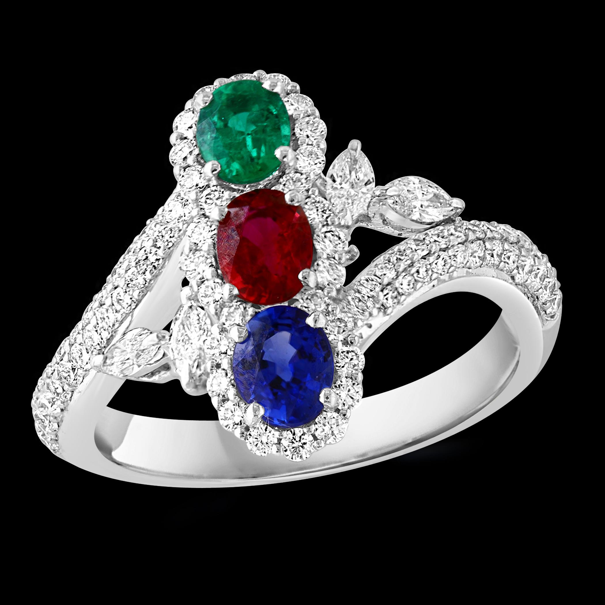 Introducing our exquisite 18 Karat Gold Ring, featuring a stunning 1.2 carat natural oval Ruby, Emerald, and Sapphire along with approximately 1.5 carats of brilliant cut diamonds. This ring is a true testament to beauty and elegance. The natural