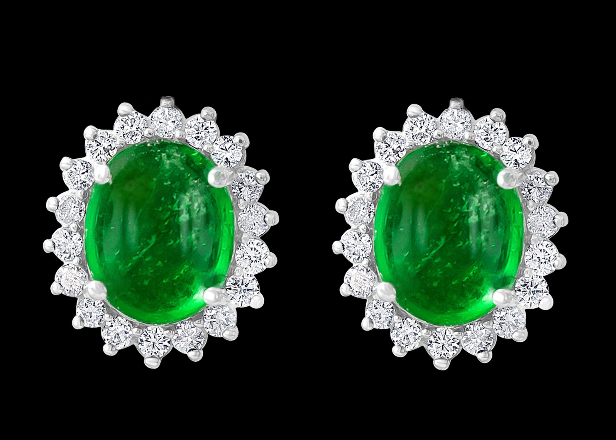 Approximately 12  Carat of Natural Zambian Emerald Cabochon earrings in White gold

Each  Emerald is about 6 carat 
Very desirable color and quality. Extreme fine color and clarity.
perfect matching pair made in 14 Karat White gold
Emerald origin is