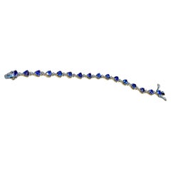 12 Ct Natural Trillion Tanzanite & 0.50 Ct Diamond Tennis Bracelet 14 KW Gold