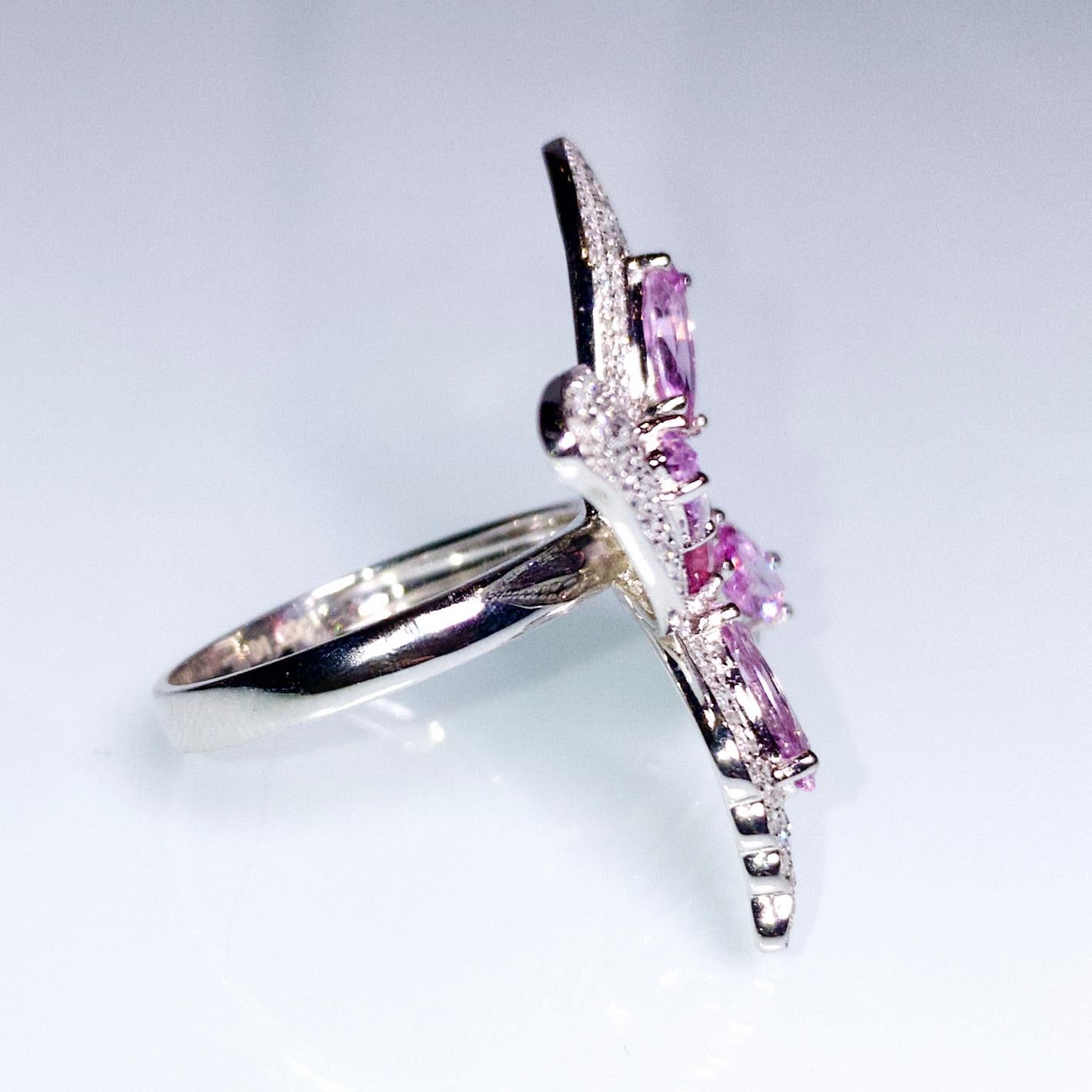 Contemporary 1.2 Ct Pinkish Orange Sapphire, Pink Sapphire and Diamond Ring in 18k White Gold