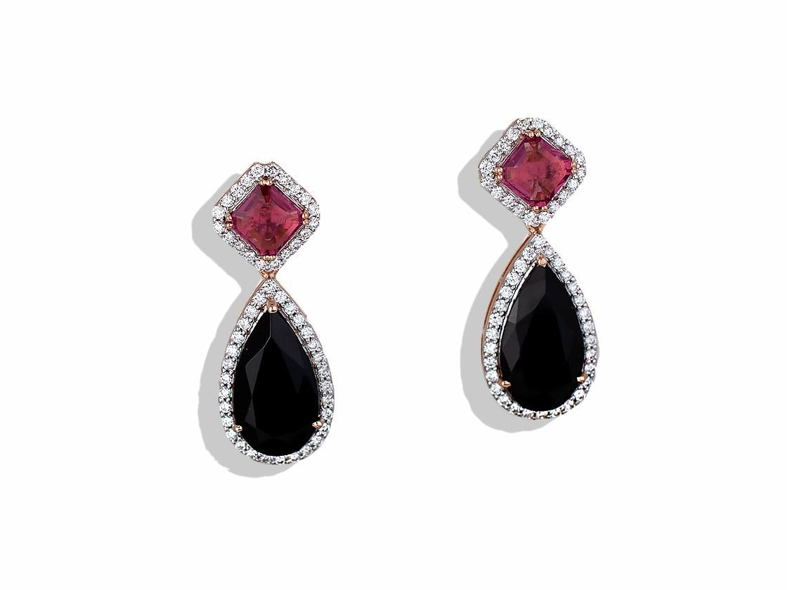 This stunning pair of earrings has something for everyone!  The earrings consist of the following, each earring has a pink 2 carat asccher cut tourmaline that sits in a four prong head.  Below the tourmaline sits a custom cut 3 carat onyx.  lastly