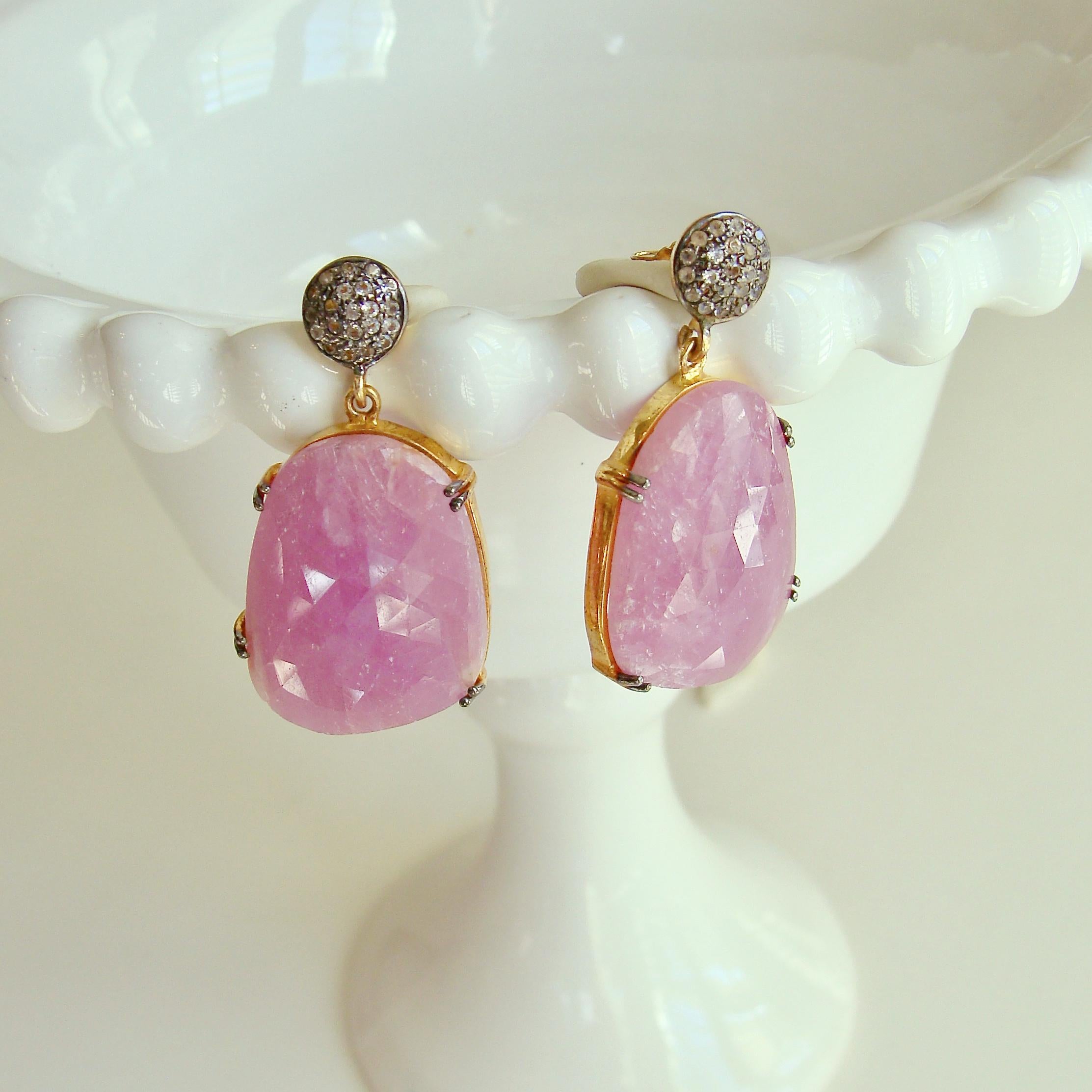 12 Days of Christmas - Pink Sapphire w White Topaz Post - Sapphire Earrings

Originally $162.00  On Sale $122.00

These stunning pink earrings in pink sapphire are not only cut to perfection but are encrusted with rounded white sapphire posts, set