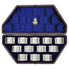 12 Elkington & Co. Servilleteros de plata c1849 En caja