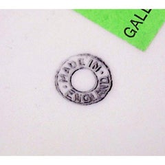 12 English green-and-white porcelain dinner plates with gold swag design