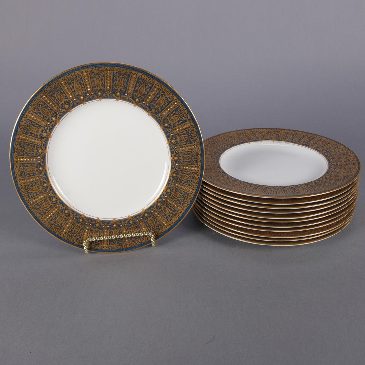 Set of 12 English Royal Worcester for Ovington Bros. Co. fine china porcelain dinner plates feature rims with gilt Moorish design over cobalt blue ground, en verso stamped, circa 1900.

Measures: .75