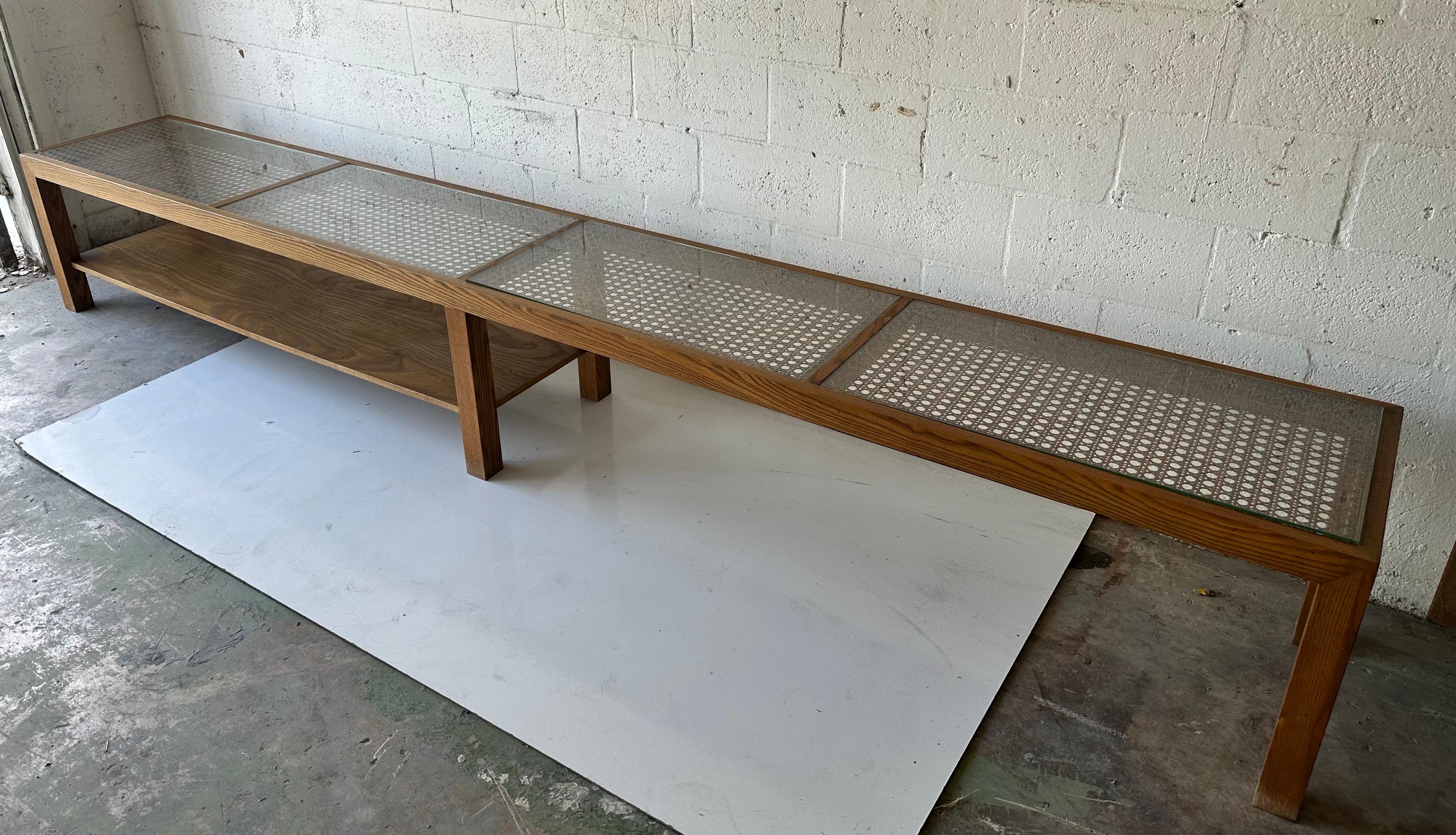 12 Feet long Cane Low Console Table.
4 glass top on each cane section.
