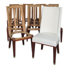 12 finas sillas de comedor francesas de caoba de los años 50 de Jacques Adnet