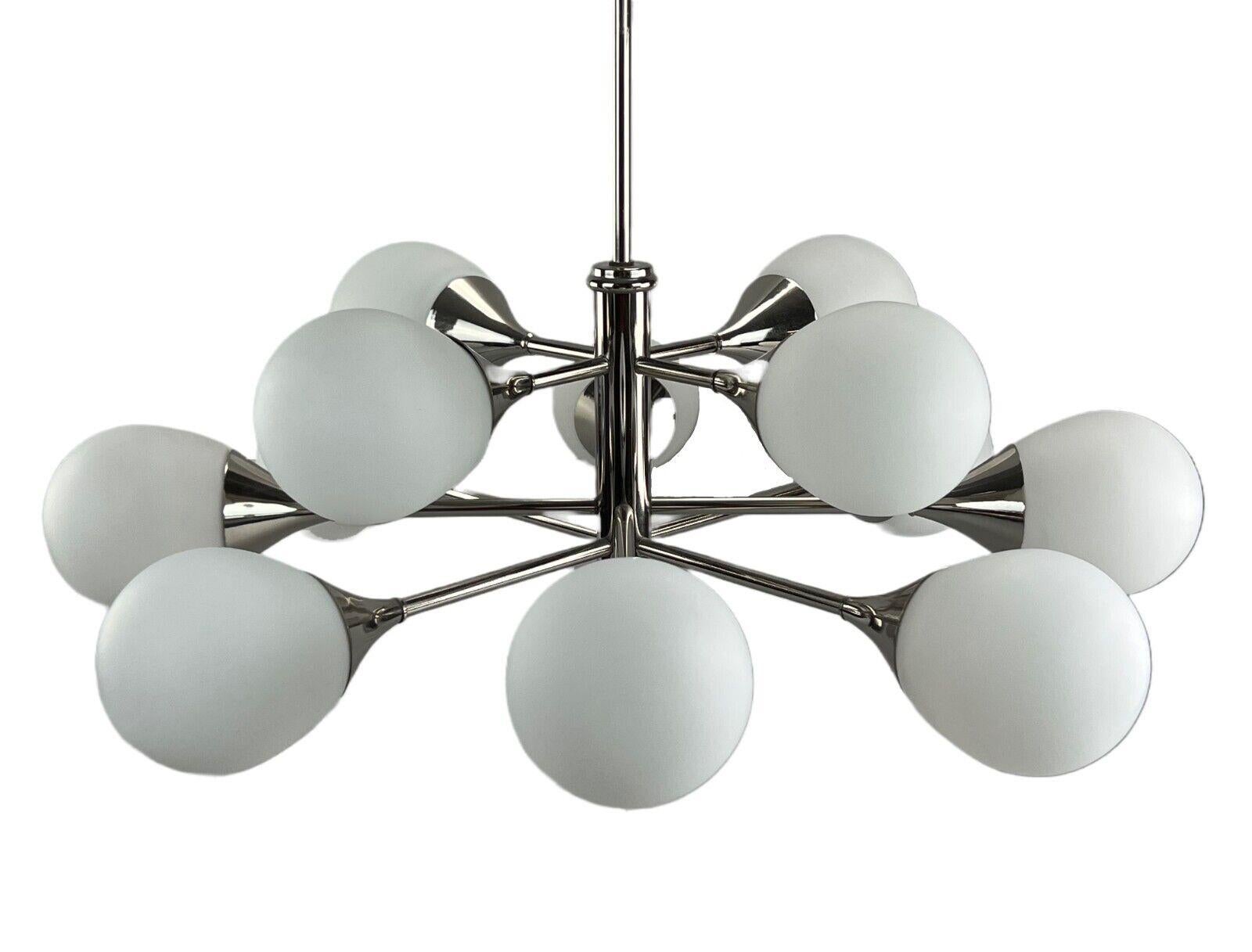 12-flame Sputnik chandelier from the 1960s and 1970s, Kaiser Leuchten, opal glass design

Object: ceiling lamp

Manufacturer: Kaiser lights

Condition: good

Age: around 1960-1970

Dimensions:

Diameter = 62.5cm
Height = 56cm

Other