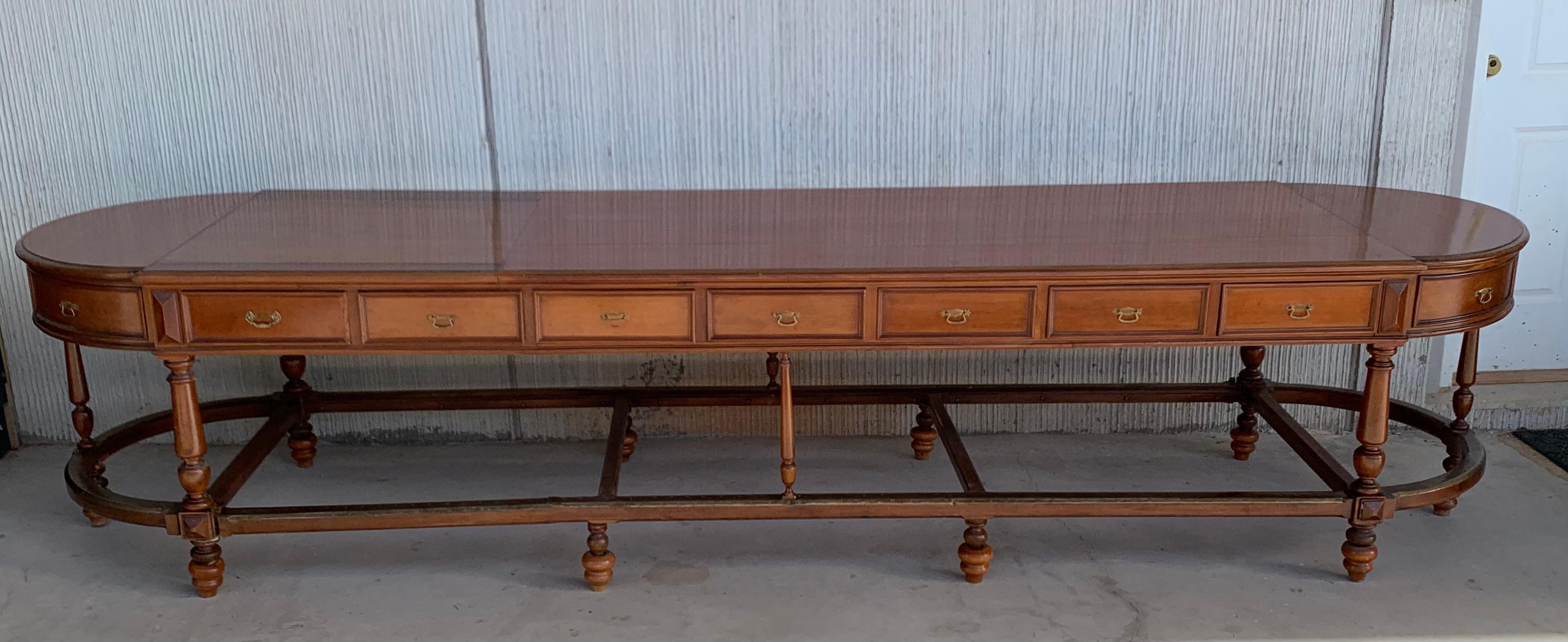 Spanish 12 foot oval center table with drawers in both sides, 20th century
Seven drawers in each side and more drawers in the oval sides
Metal reforce in the stretches.