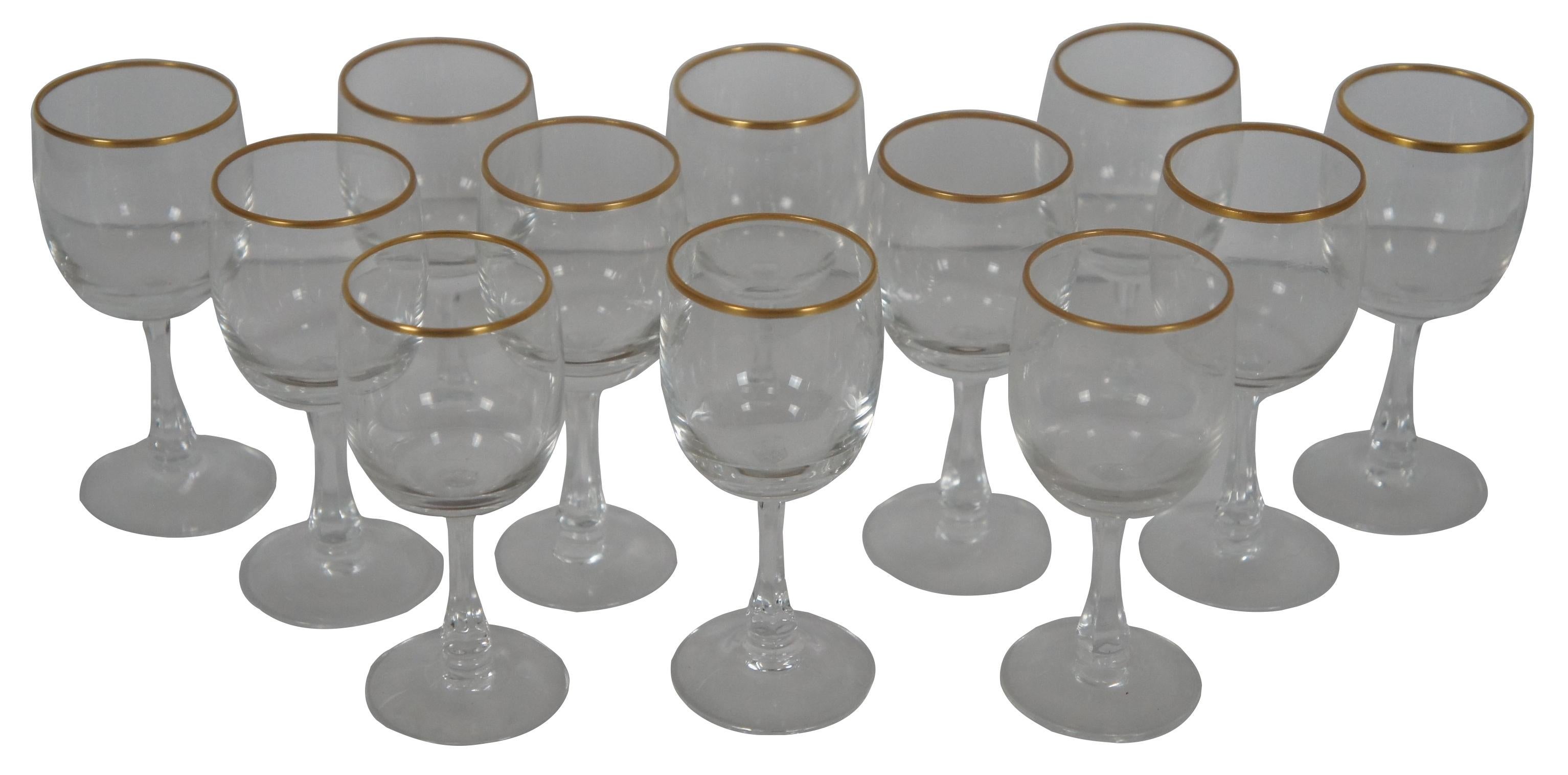 Set of twelve vintage crystal tantalus decanter cordial or liqueur glasses with gilded top edge. Measure: 3.5