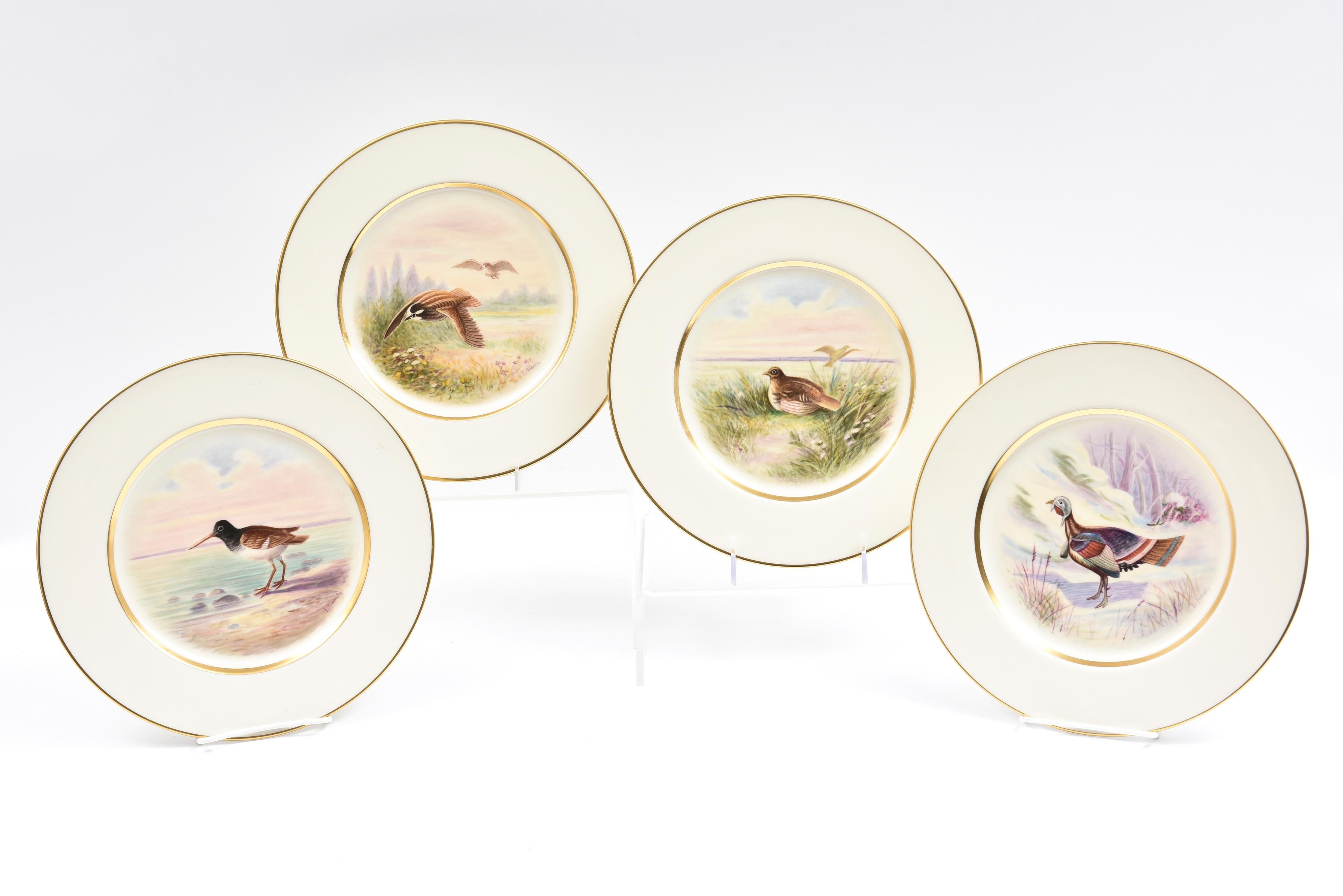 Fully decorated with native flora and fauna, this set of 12 well designed and beautifully hand painted plates depict various game birds in their natural Habitat. On Fine bone china from Lenox and each one signed by the artist (L Nemetz) and species