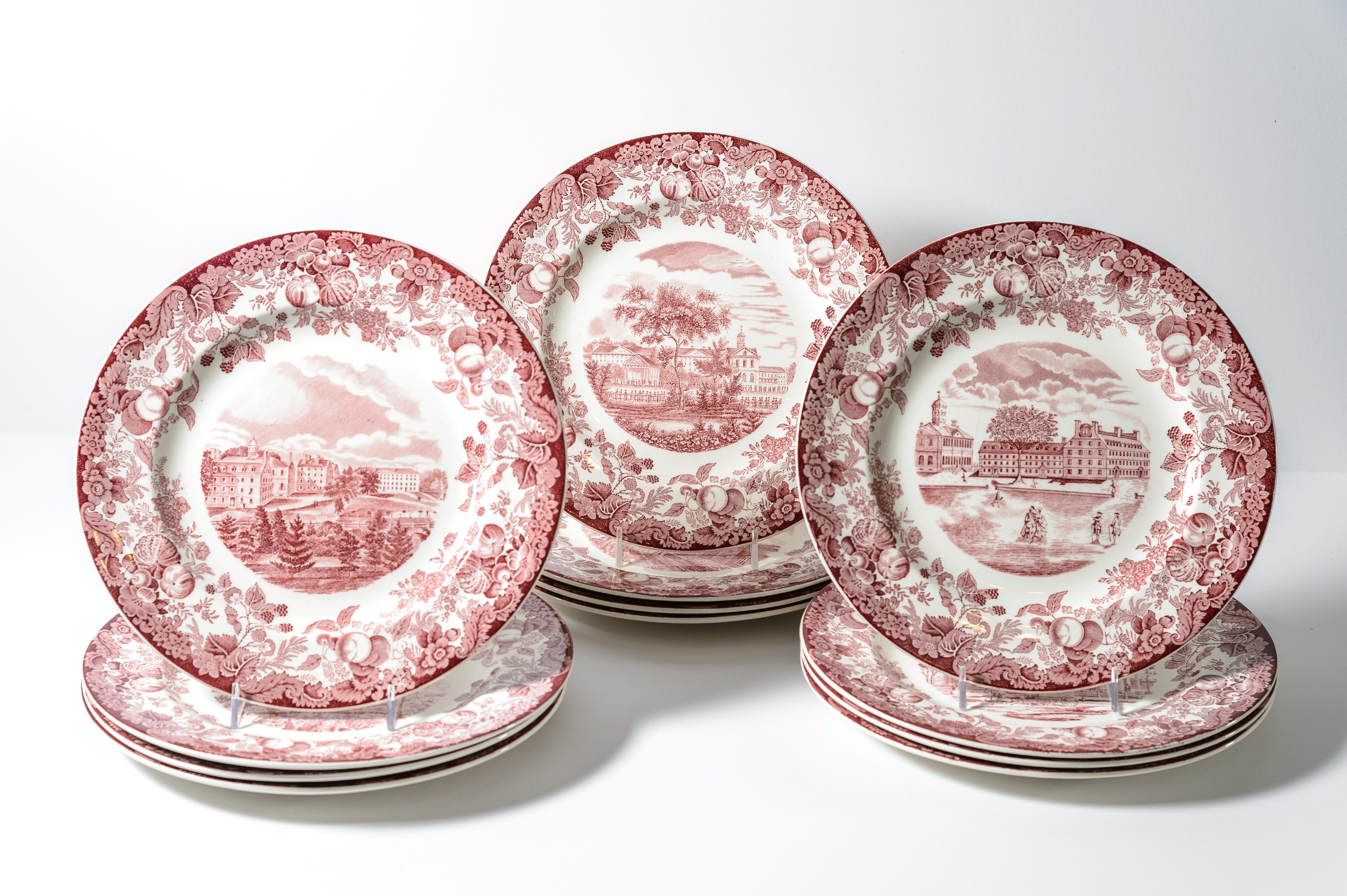 A set of 12 dinner plates of Harvard University in their signature red color. These were meticulously produced by Wedgwood England and shows crisp detail throughout. They are in very good vintage condition and listed below are the scenes they