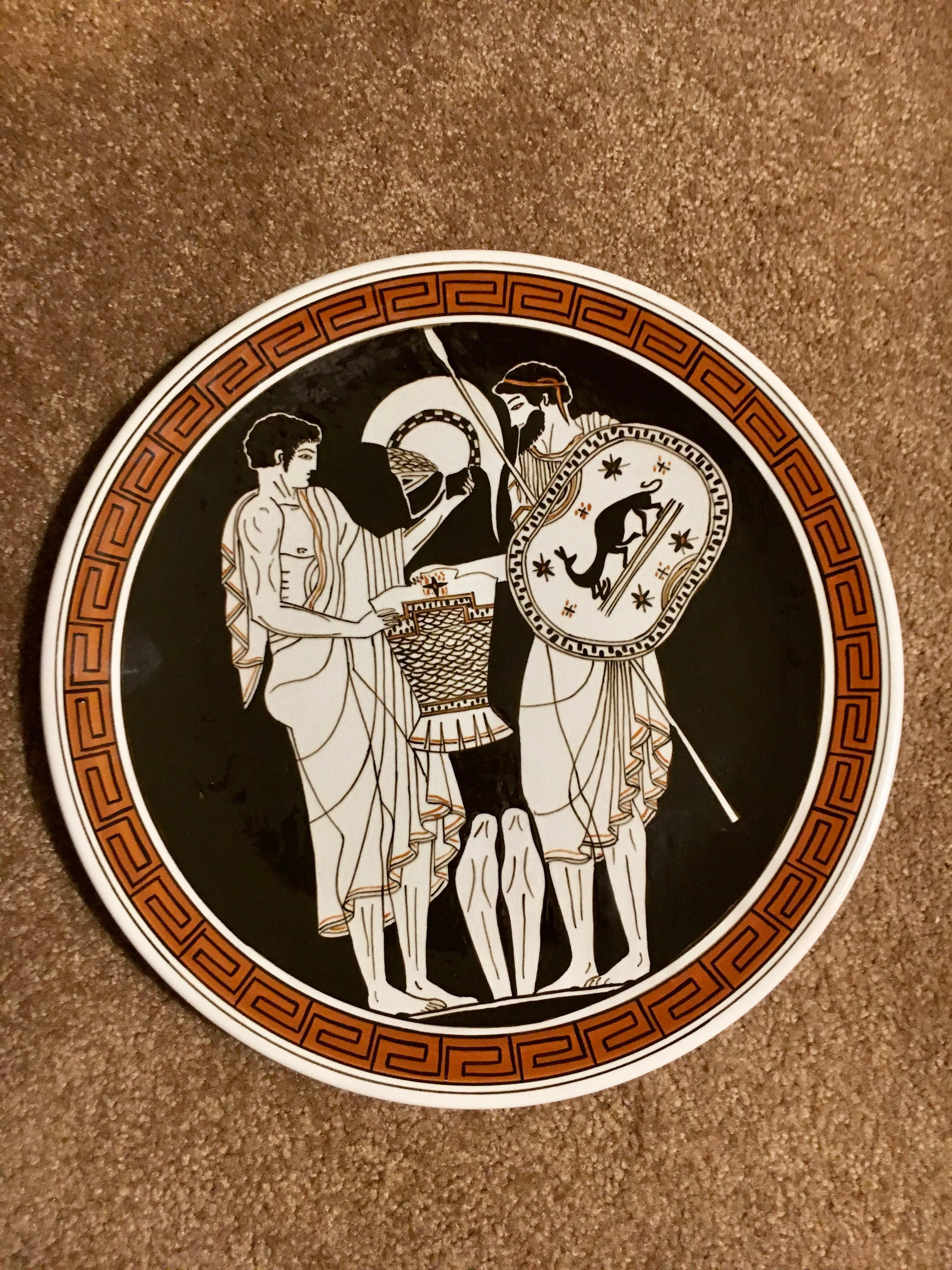 12 Inch Decorative Grecian Plate with Greek Key perimeter and three soldiers. affixed with with built in wall hanger, see photos.