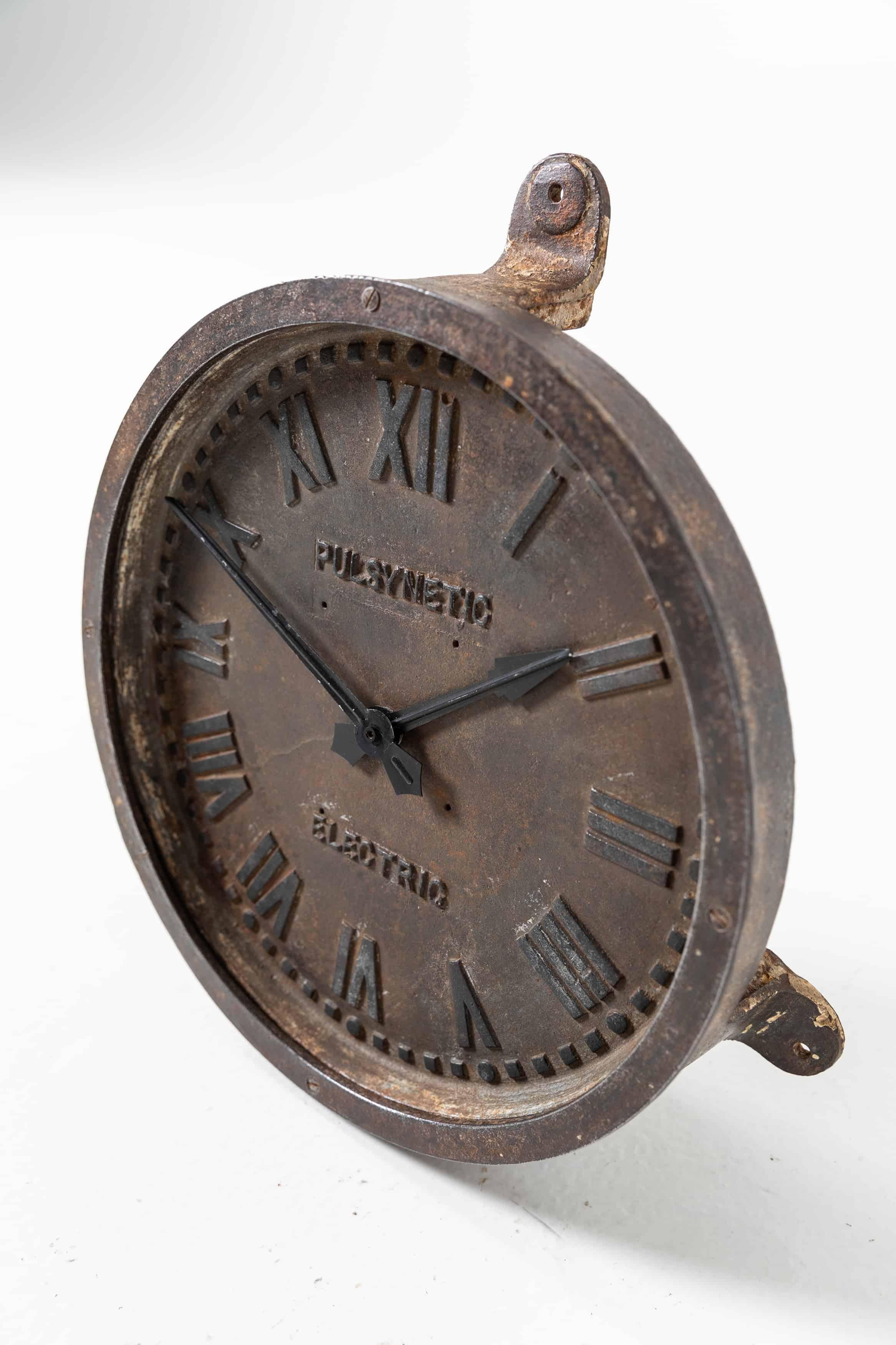 Beautiful example of the iconic cast iron factory wall clock made in England by Gents of Leicester. c.1930. Measure: 12