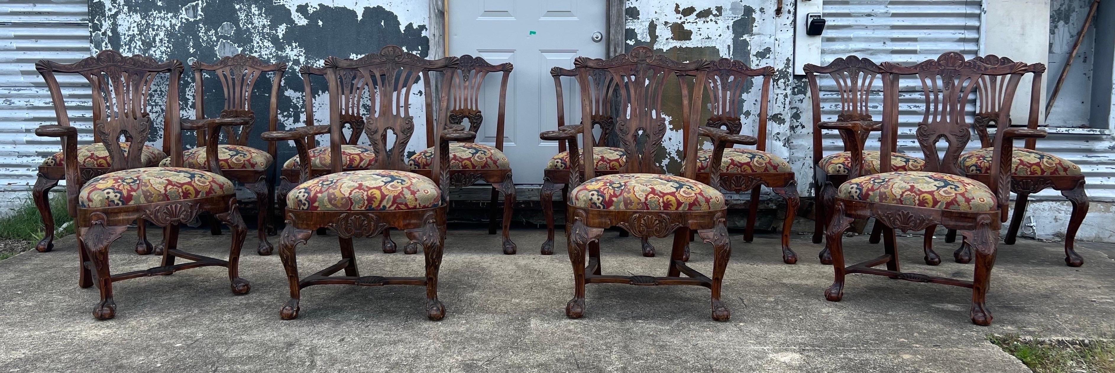Great set of 12 19th century Irish dining chairs with a 19th- early 20th century label from an antiques dealer in Dublin. 

Set is comprised of 4 arm chairs and 8 sides, indicating they were probably from a much larger set made for a stately home.