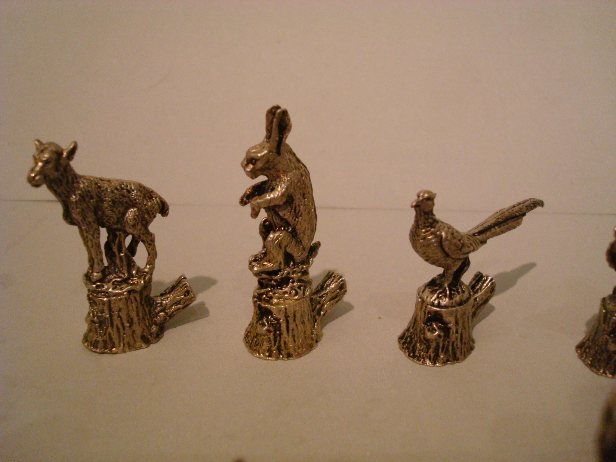 12 Italian 800 silver animal place card holders
Set of twelve place card holders. Silver tone finish. Each has a different animal. Rabbit, pheasant, bird, hare, goat and dog plus others. All Different. Made of Silver. Presented in their original