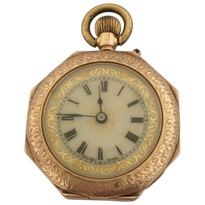 12K Gold Octagonal Shape Case Antique Pocket / Fob Watch.

This beautiful 30mm diameter antique ladies pin set fob watch is in good working condition and it is ticking nicely. Visible signs of ageing and wear with light tiny marks on the case as