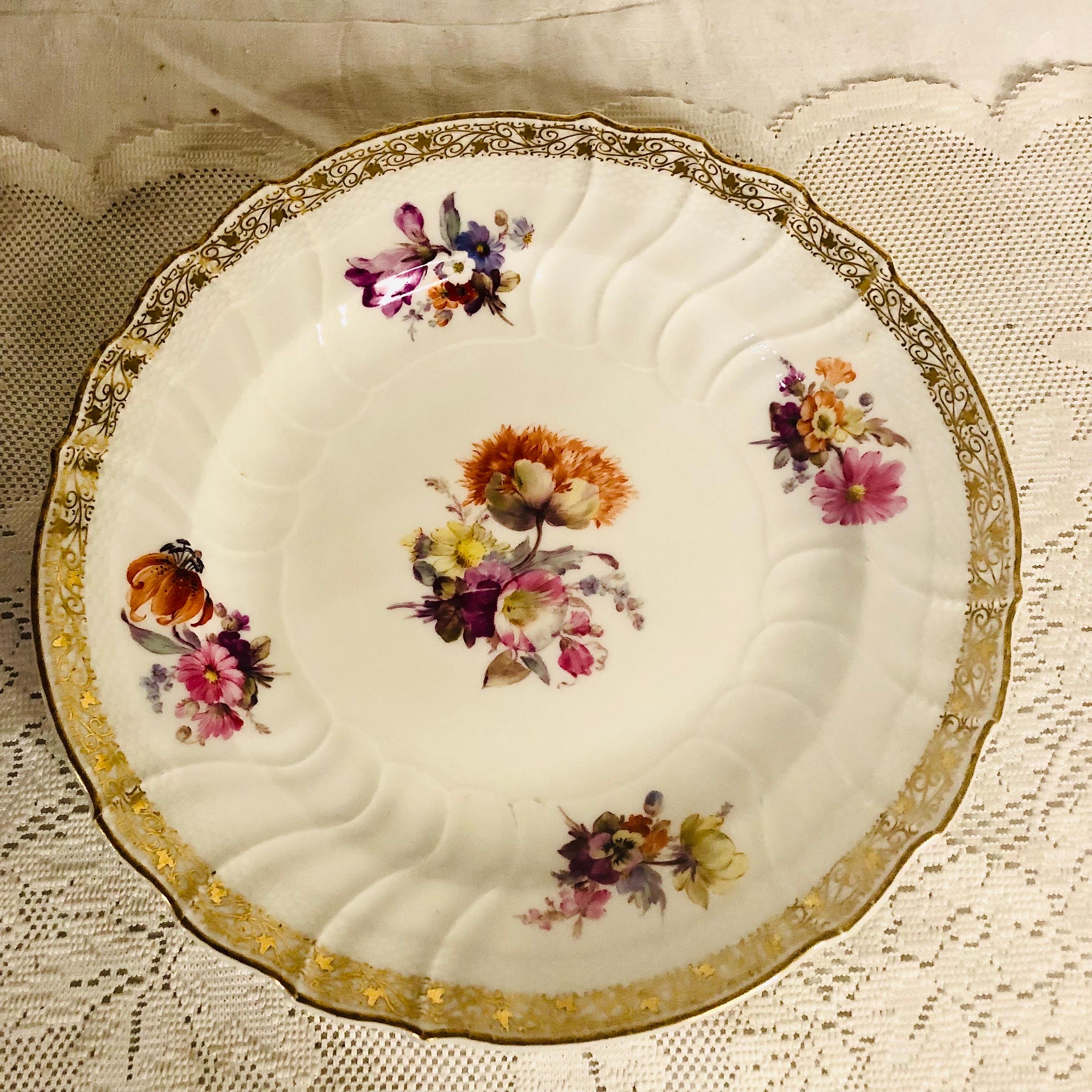 12 KPM Dinner Plates, Each Hand-Painted with a Different Central Flower Bouquet In Good Condition For Sale In Boston, MA