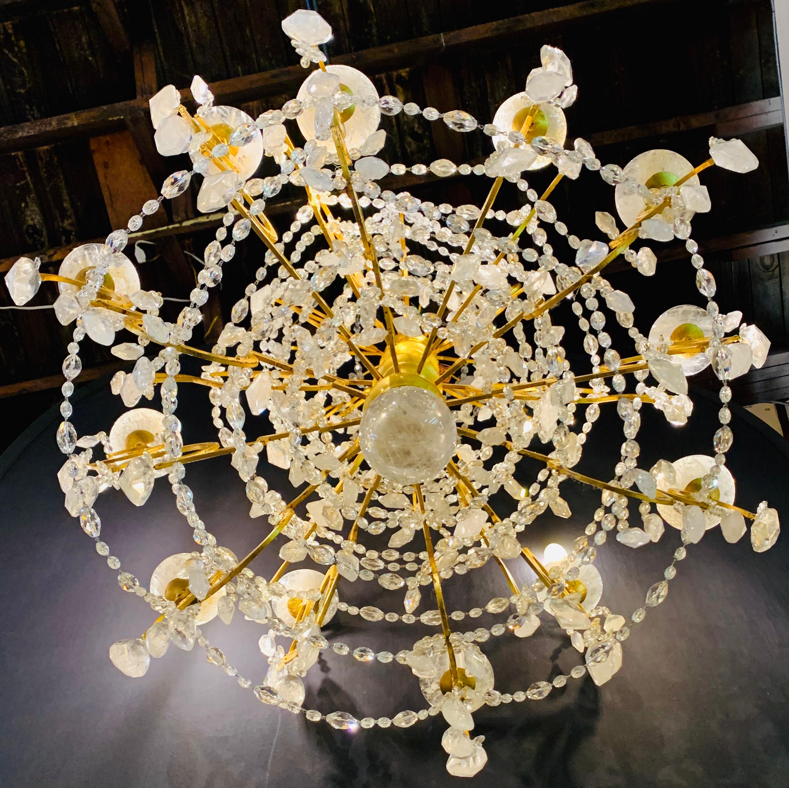 12 Light Gilt Metal Rock Crystal Chandelier. Hollywood Regency in Style In Good Condition For Sale In Stamford, CT