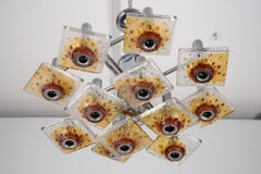 12-light Mazzega chandelier in amber and clear murano glass and chrome. Italy 70