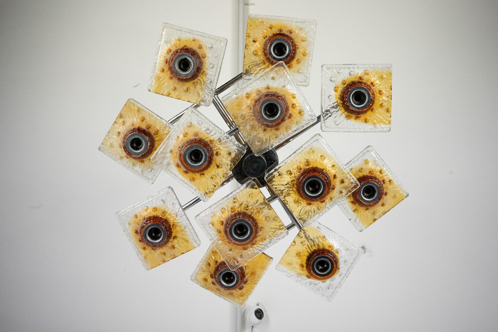 20th Century 12-light Mazzega chandelier in amber and clear murano glass and chrome. Italy 70 For Sale