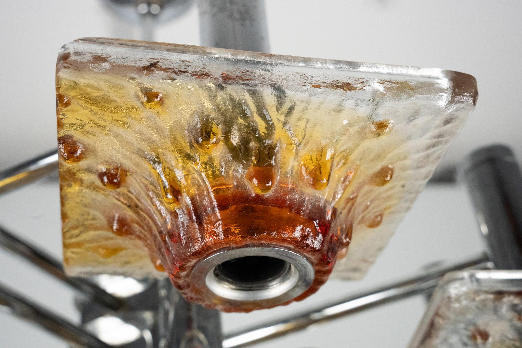 Murano Glass 12-light Mazzega chandelier in amber and clear murano glass and chrome. Italy 70 For Sale