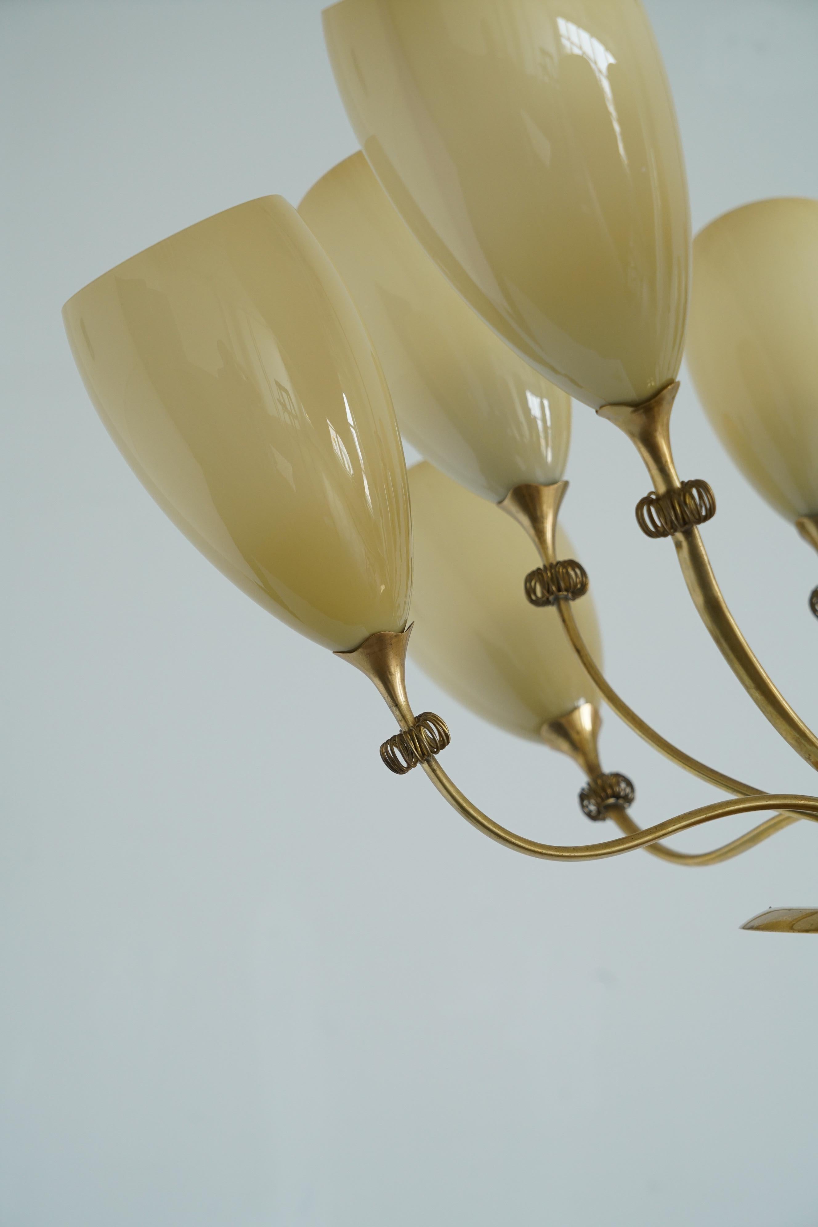 Milieu du XXe siècle Lustre à 12 lumières de Paavo Tynell en vente