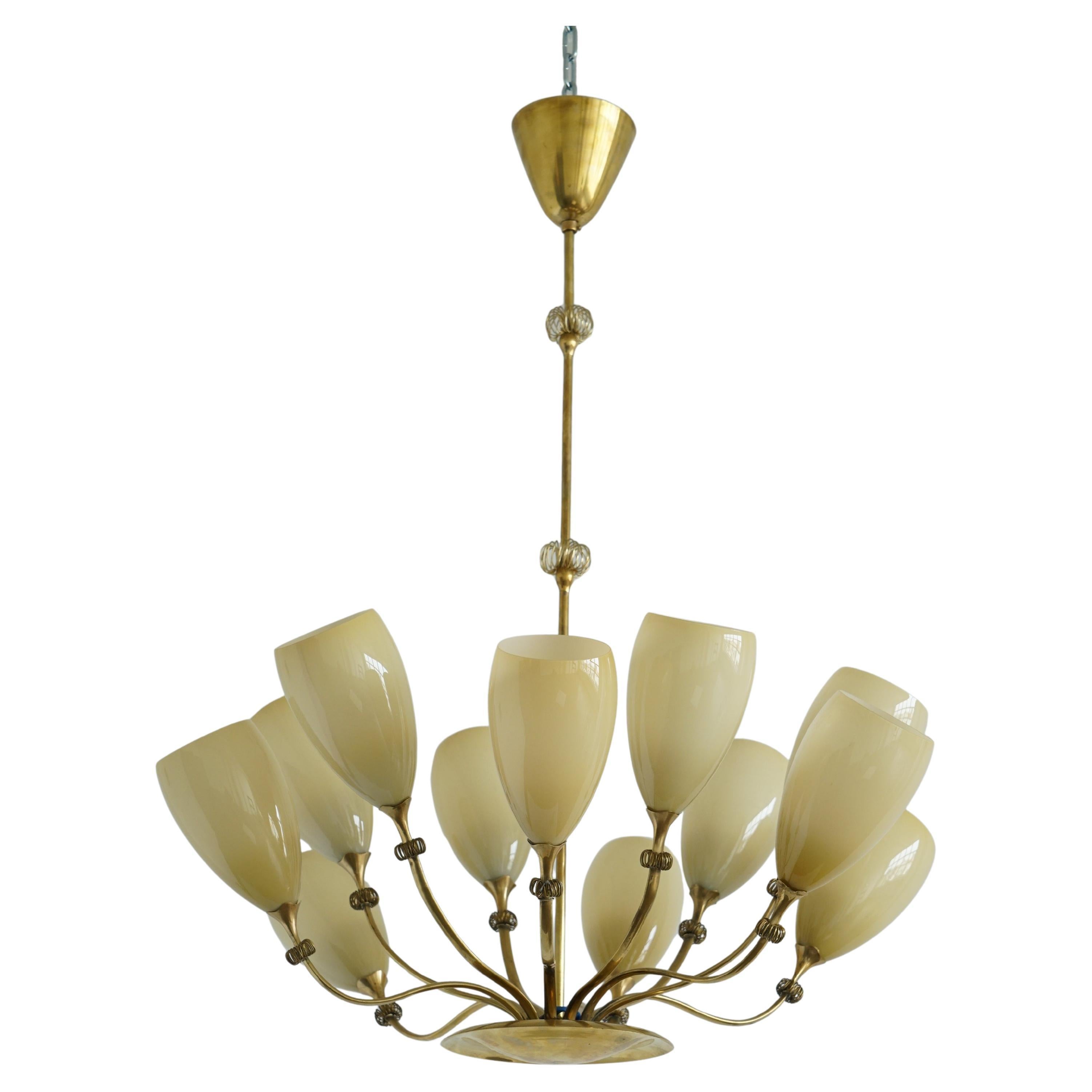Lustre à 12 lumières de Paavo Tynell en vente