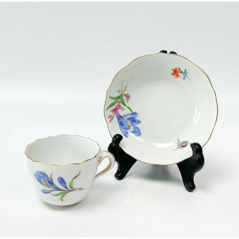 12 Meissen Germany hand painted porcelain Demitasse cups & saucers florals

A white ground with various colorful floral decoration, each cup with a matching saucer. Gilt to the scalloped rim. Meissen crossed swords mark to the underside. Each with