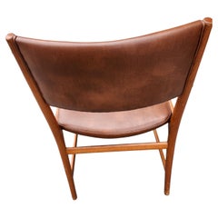 12 chaises de salle à manger danoises modernes du milieu du siècle en cuir de teck par Kai Lyngfeldt Larsen