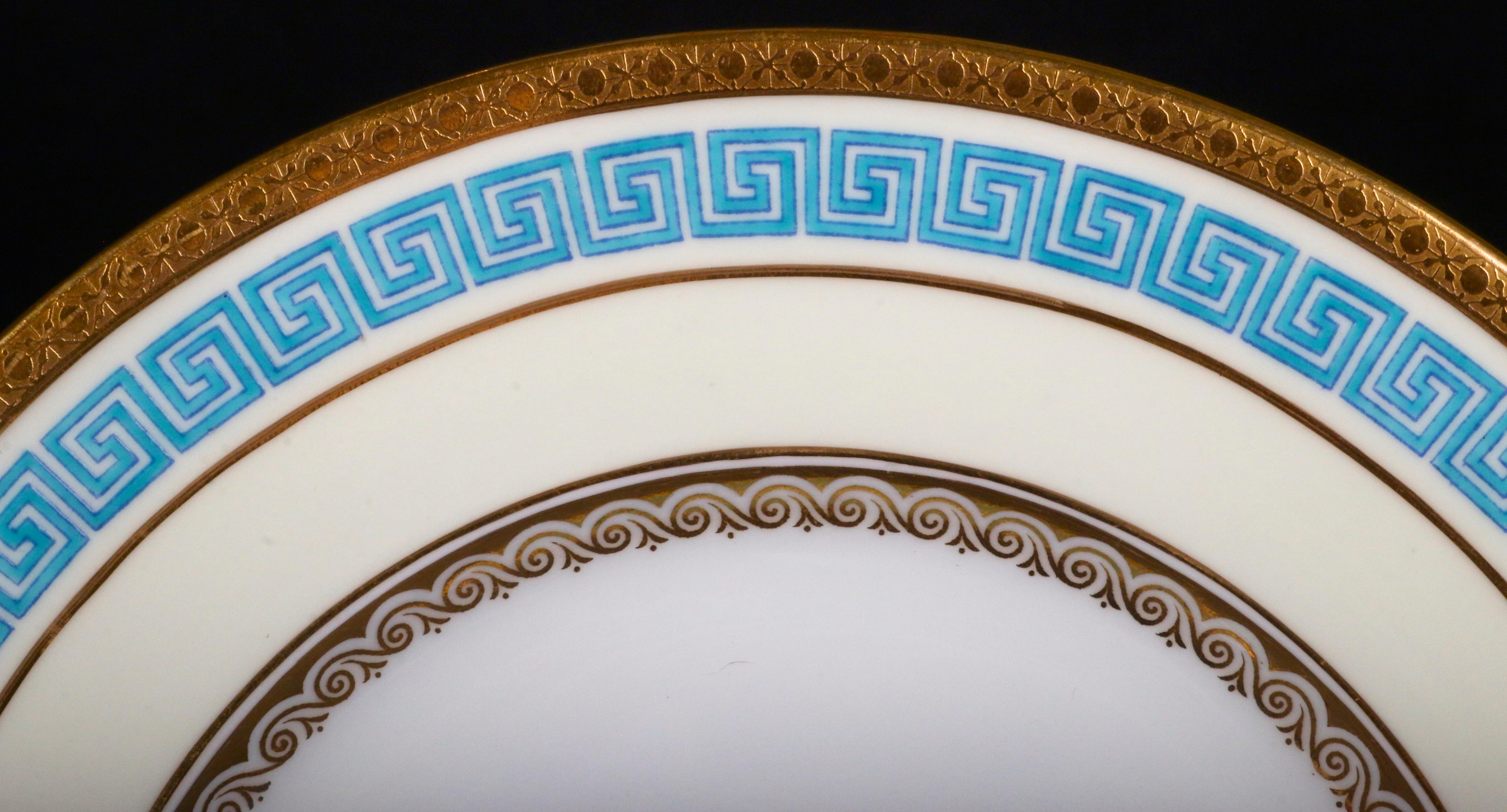 These 12 Minton antique neoclassical style plates from Minton, Stoke-on-Trent, England. Are perfect for lunch, appetizer, salad or dessert. The decoration on these plates utilizes 2 classical Greek patterns: an enamel celeste-bleu (heavenly blue) or