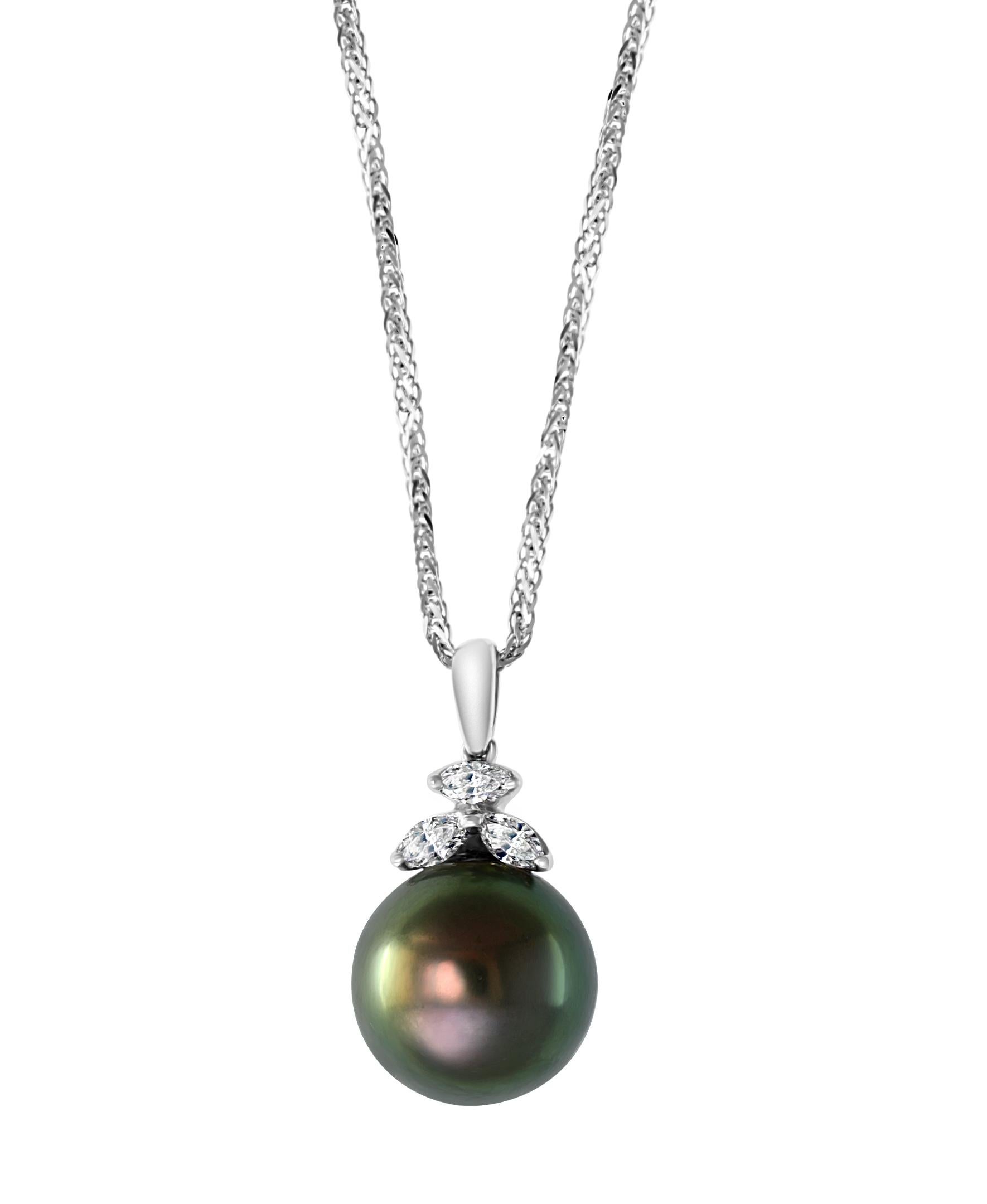 12 MM Black Tahitian Pearl & Diamond Pendant / Necklace 18 Karat Gold With Chain
A  Beautiful Necklace for every day , work or small get together.
 12 mm Pearl very clean , in round shape , full of luster and shine  . 
3  pieces of Marquis diamonds 