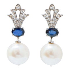 12 Mm White Pearls, Sapphires, Diamonds, 14 Karat White Gold Earrings.