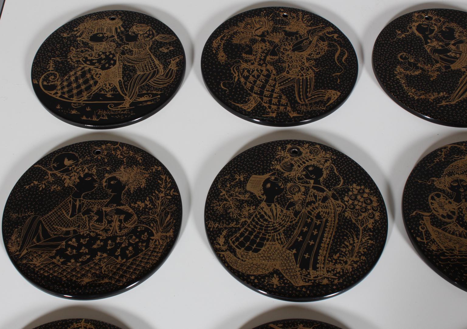 A complete set of 12 beautiful black and gold wall plates, designed by Bjorn Wiinblad for Nymolle Denmark, 1970s. 

Each of these plaques represents a month. They display the charming story of a young couple from falling in love in January,