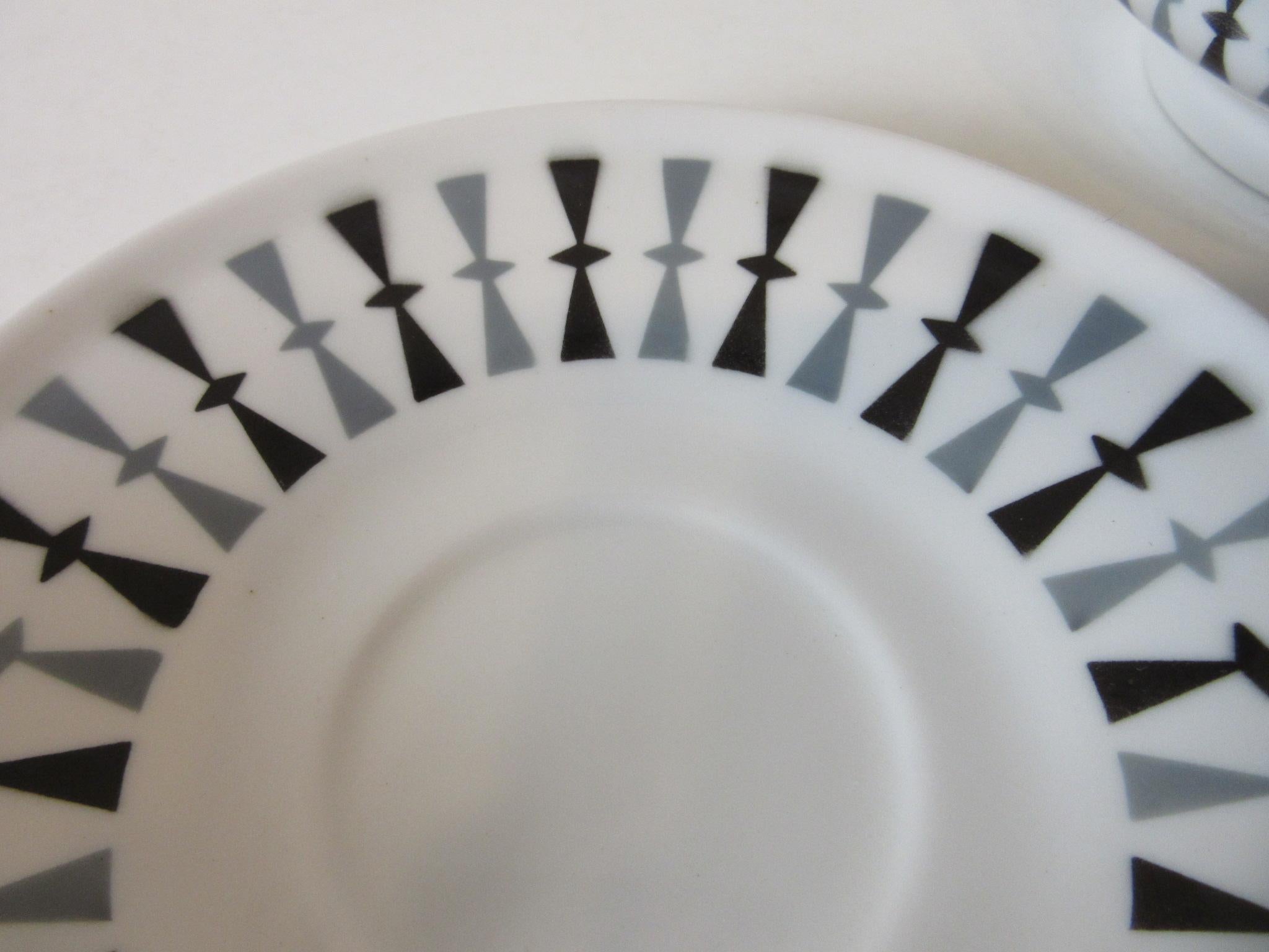 A very fine 72 pc. Paul McCobb china set making 12 ( six) piece place settings with great graphics for the Jackson China company from the Contempri collection. This pattern and design was in limited production from 1959 to 1960 in a restaurant style