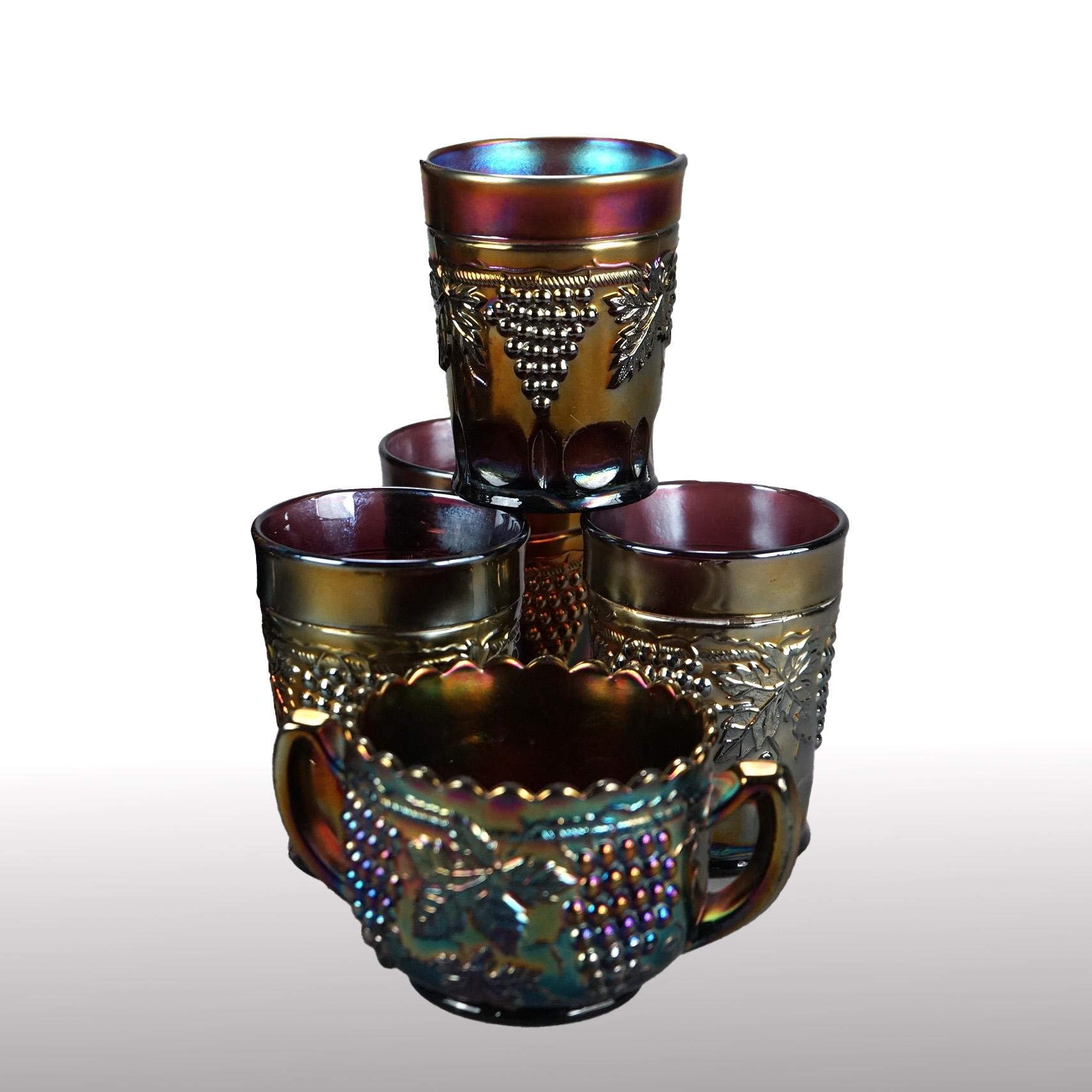 12 Piece Antique Carnival Glass Beverage Set with Grape & Leaf Pattern c1910

Pitcher - 8 1/4