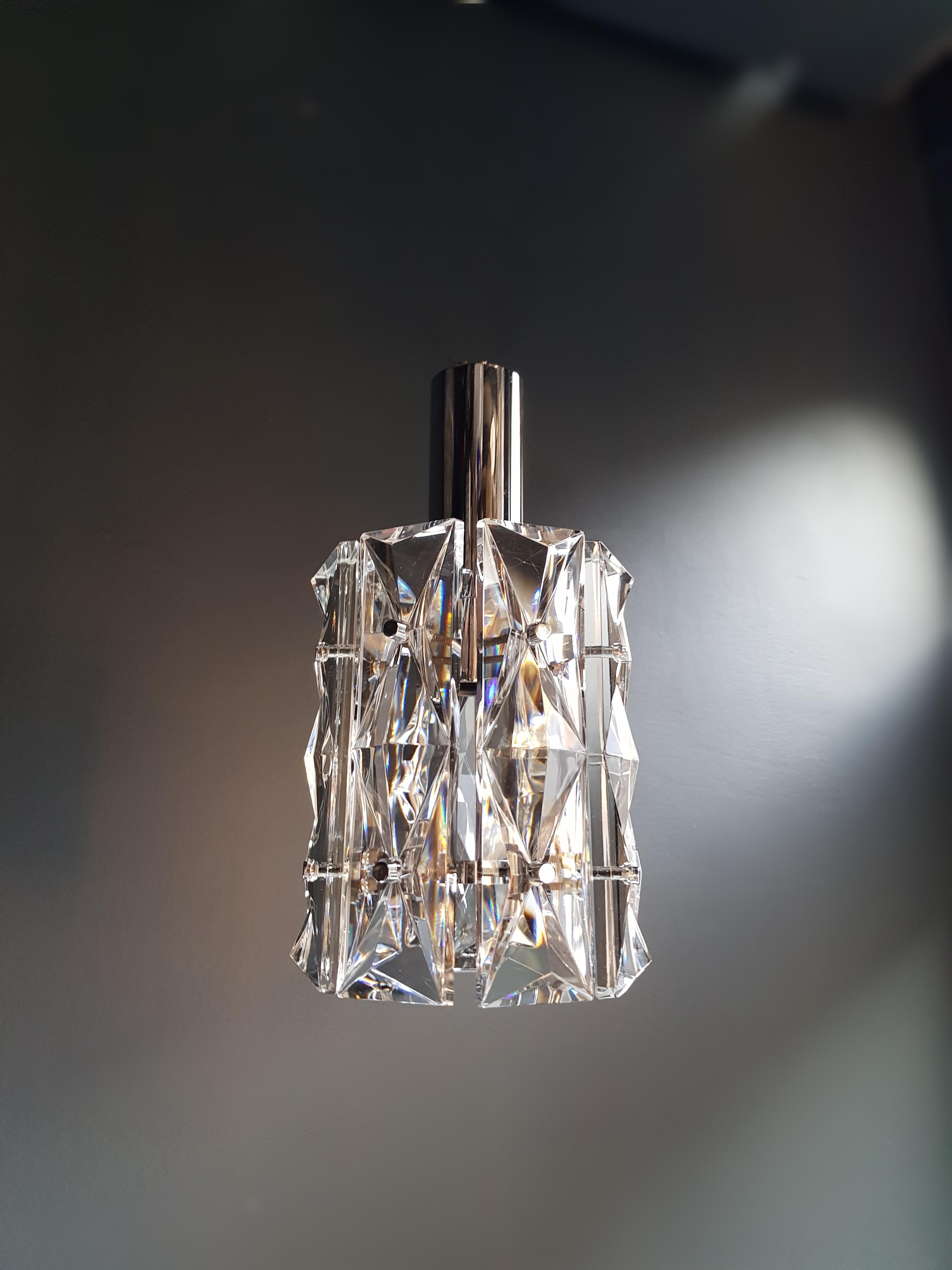 Chrome crystal glass chandelier lamp by Kinkeldey, Germany, 1970s.

Measures: Total height 33 cm, diameter 16 cm. Weight (approximately): 1 kg.

Number of lights: 1 x bulb sockets: E27

PAT tested. Ready to hang.

Chrome crystal glass
