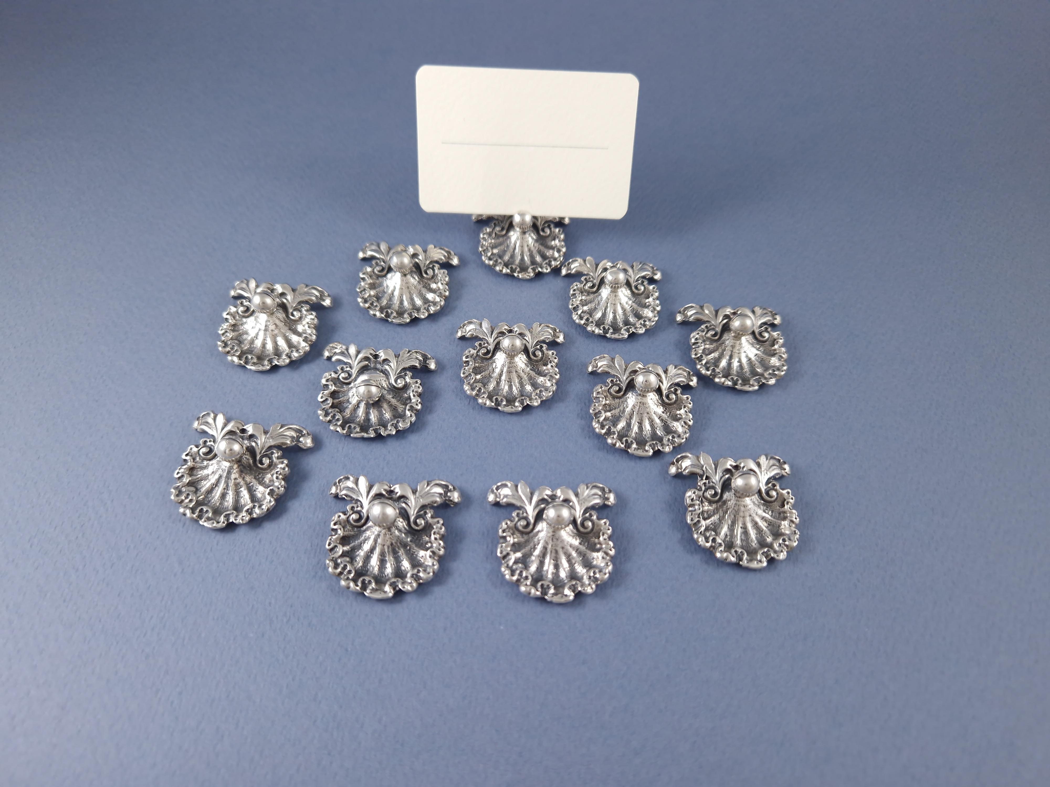 Sterling Silver 12 Place Cards Holders In Solid Silver Shell For Sale