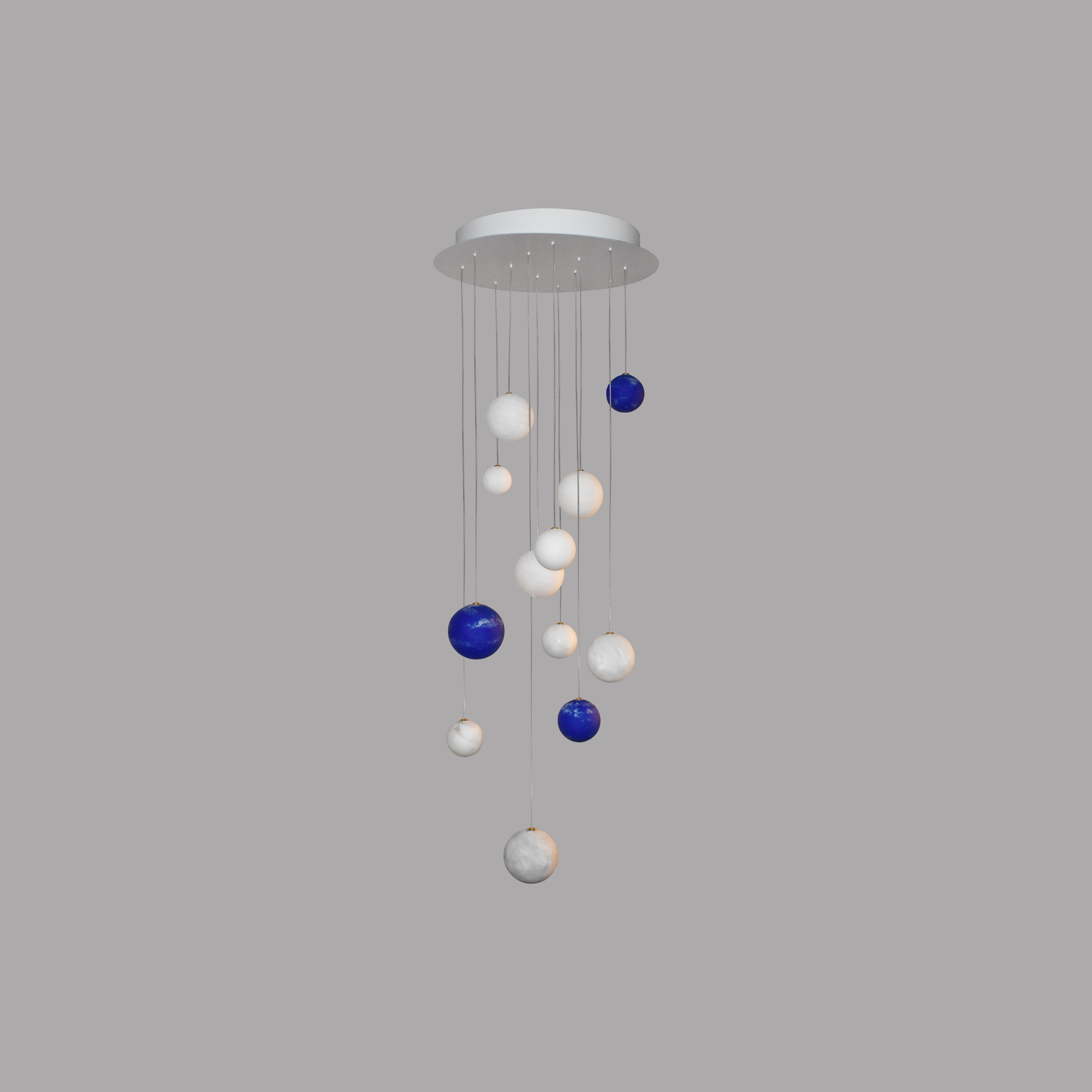 12 Planets And Ciels Chandelier by Ludovic Clément D’armont
Dimensions: Ø 60 x H 200 cm.
Materials: Blown glass and painted steel.

Every creation of Ludovic Clément d’Armont can be made to order in any requested dimensions. 12 Planets of choice.
