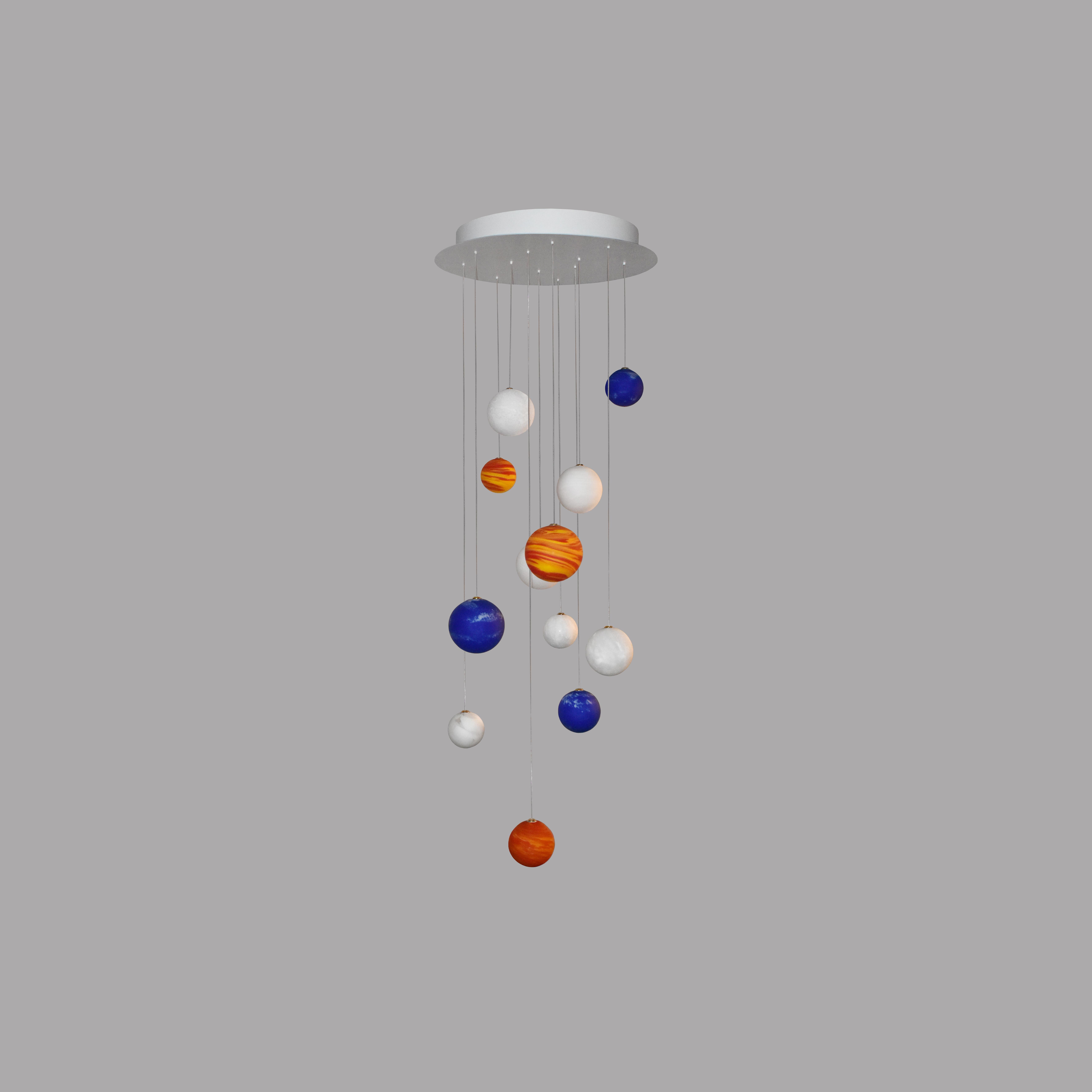 12 Planets, Ciels And Couchers De Soleil Chandelier by Ludovic Clément D’armont
Dimensions: Ø 60 x H 200 cm.
Materials: Blown glass and painted steel.

Every creation of Ludovic Clément d’Armont can be made to order in any requested dimensions. 12