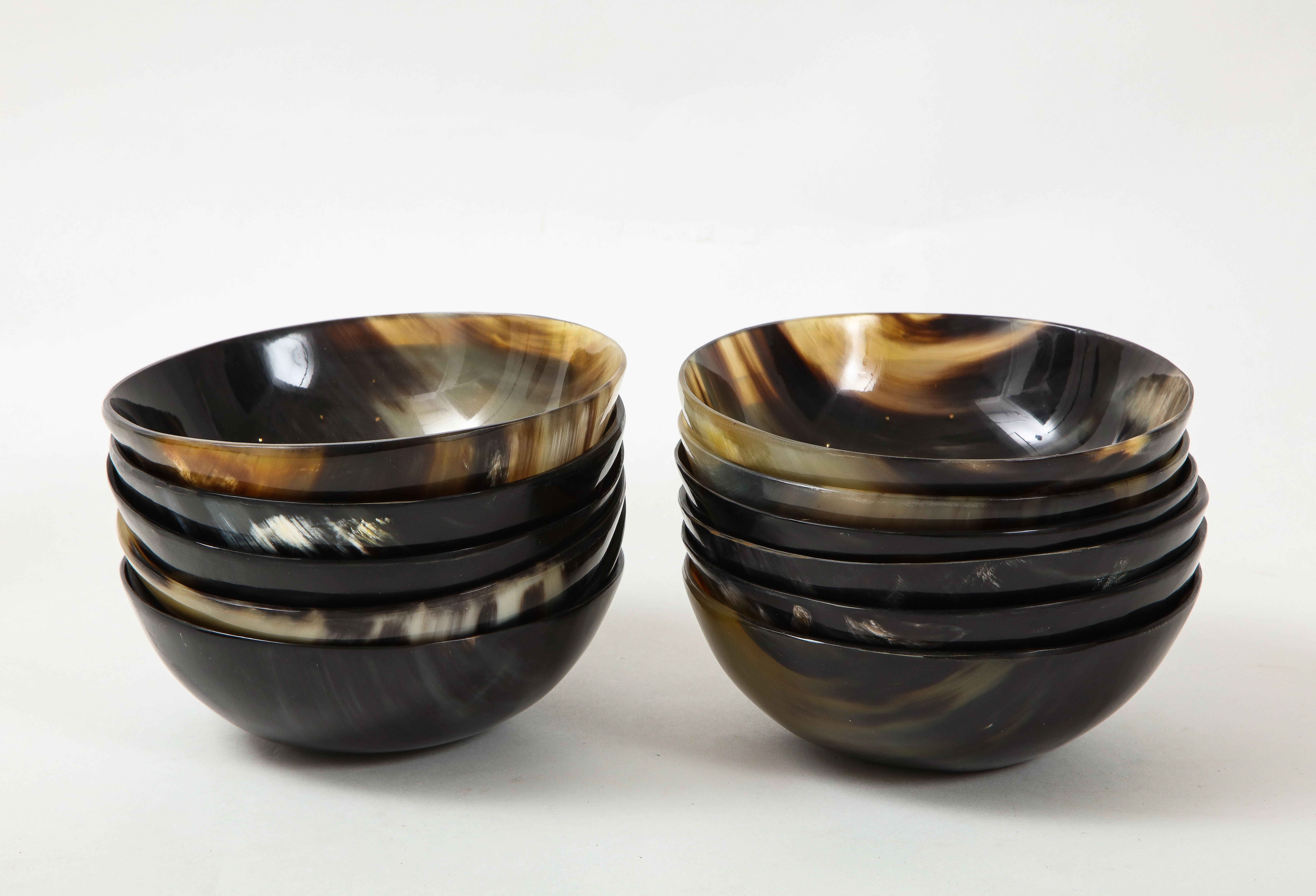 Set of 12 hand made polished horn bowls, hand wash/damp cloth only, no dishwasher.