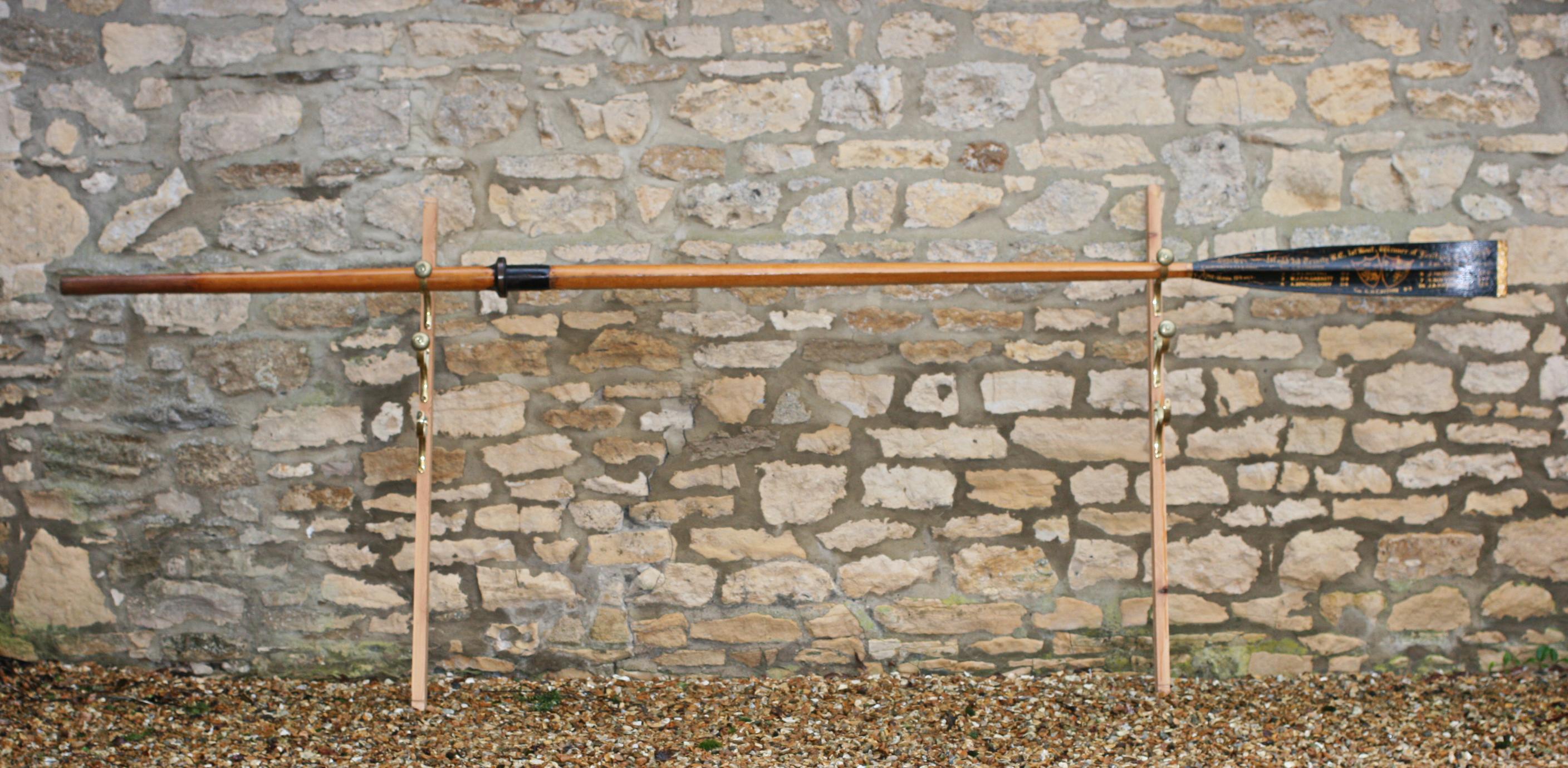 Antique Rowing Oar, Fairbairn Cup 1946, 1st & 3rd Trinity Boat Club 1946.
The full-length oar, 12 foot long, is an original traditional Cambridge University presentation rowing oar with gilt calligraphy and club and college insignias. It is a