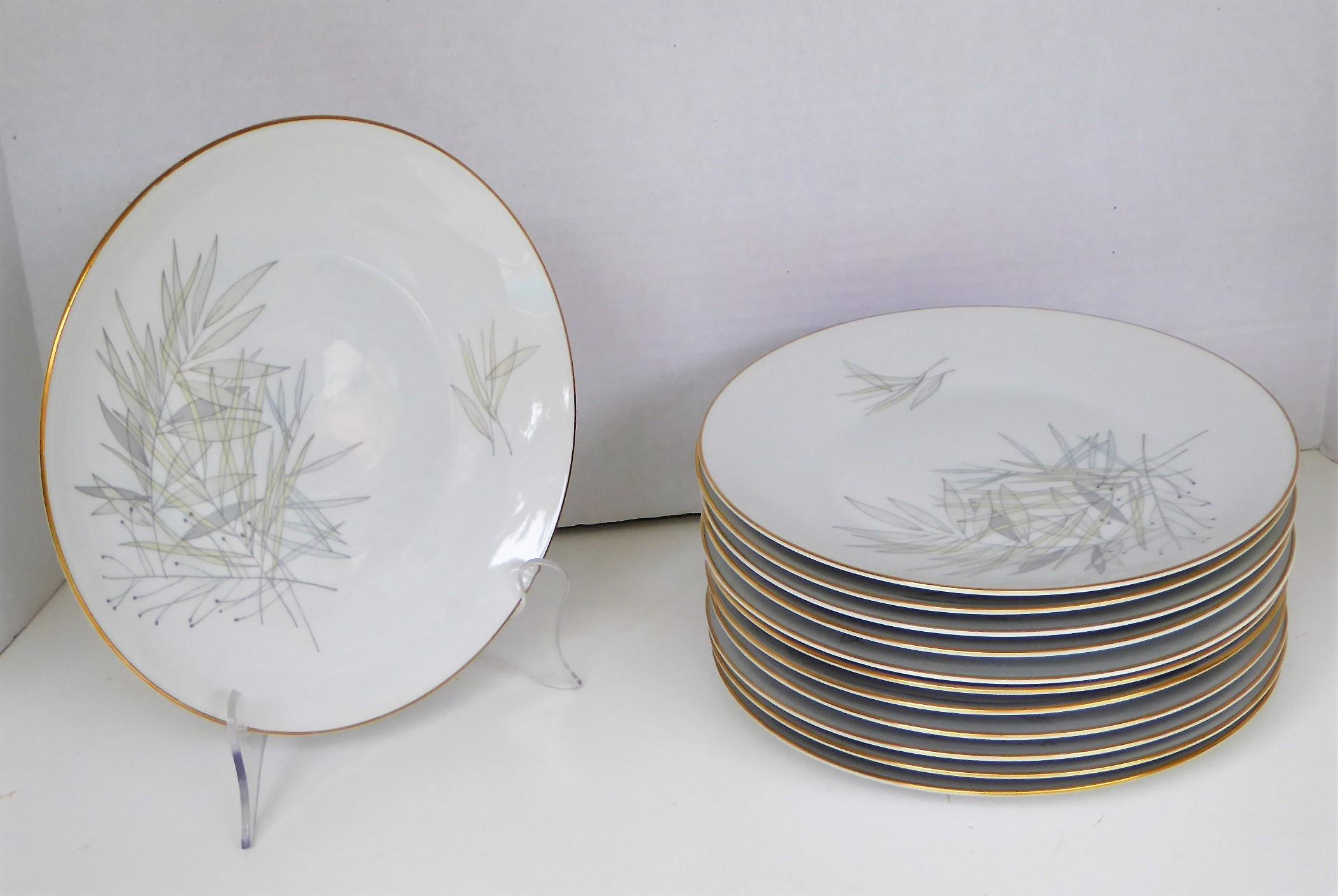 Raymond Loewy for Rosenthal, Germany Mid Century Modern  set of 12 porcelain Dinner plates  The form is the iconic 2000 Pattern: Grasses 3687. introduced in 1958.  An elegant reminder of the pleasures of mid-century modern design, this sleek dinner